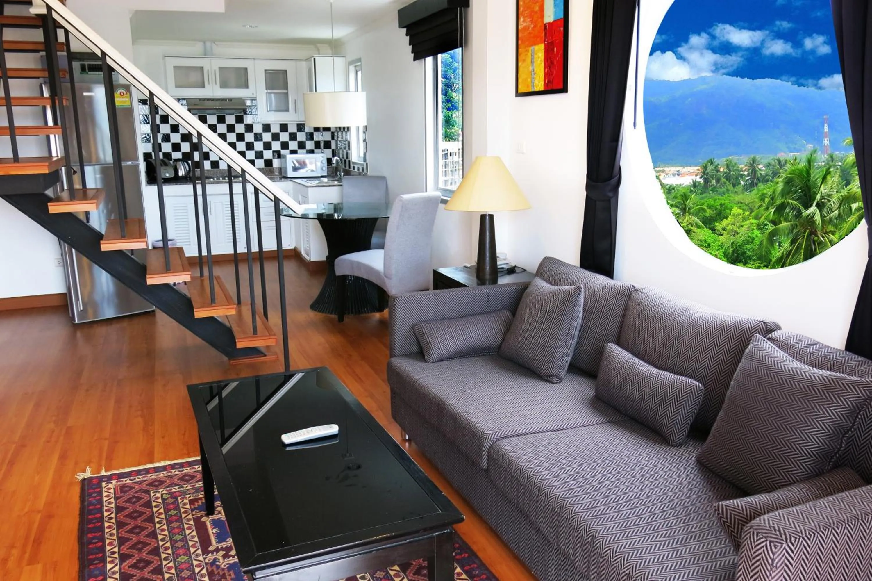 Communal lounge/ TV room in Orchid Kathu Heights Service Apartments