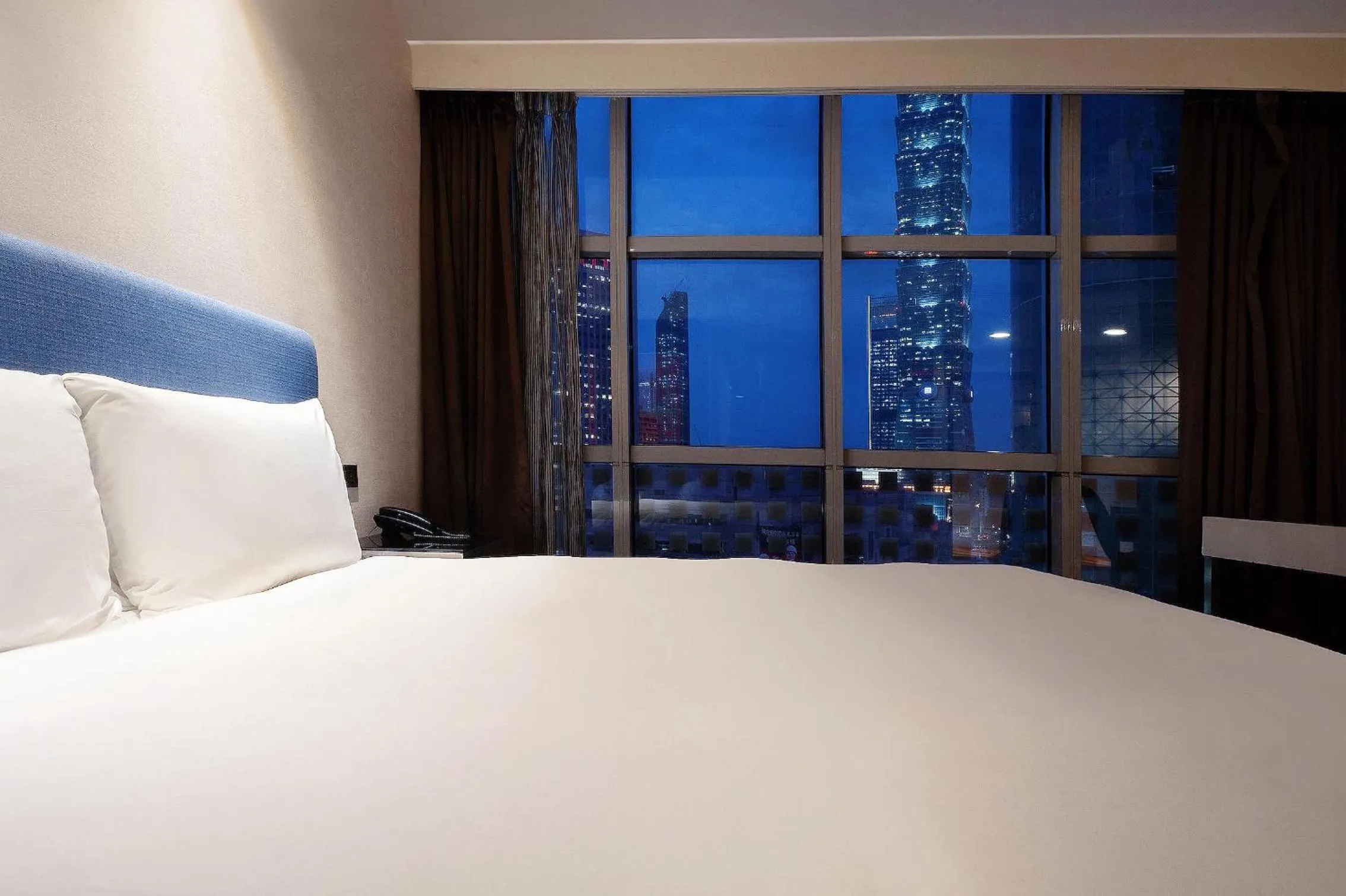 On site, Bed in CHECK inn Taipei Xinyi