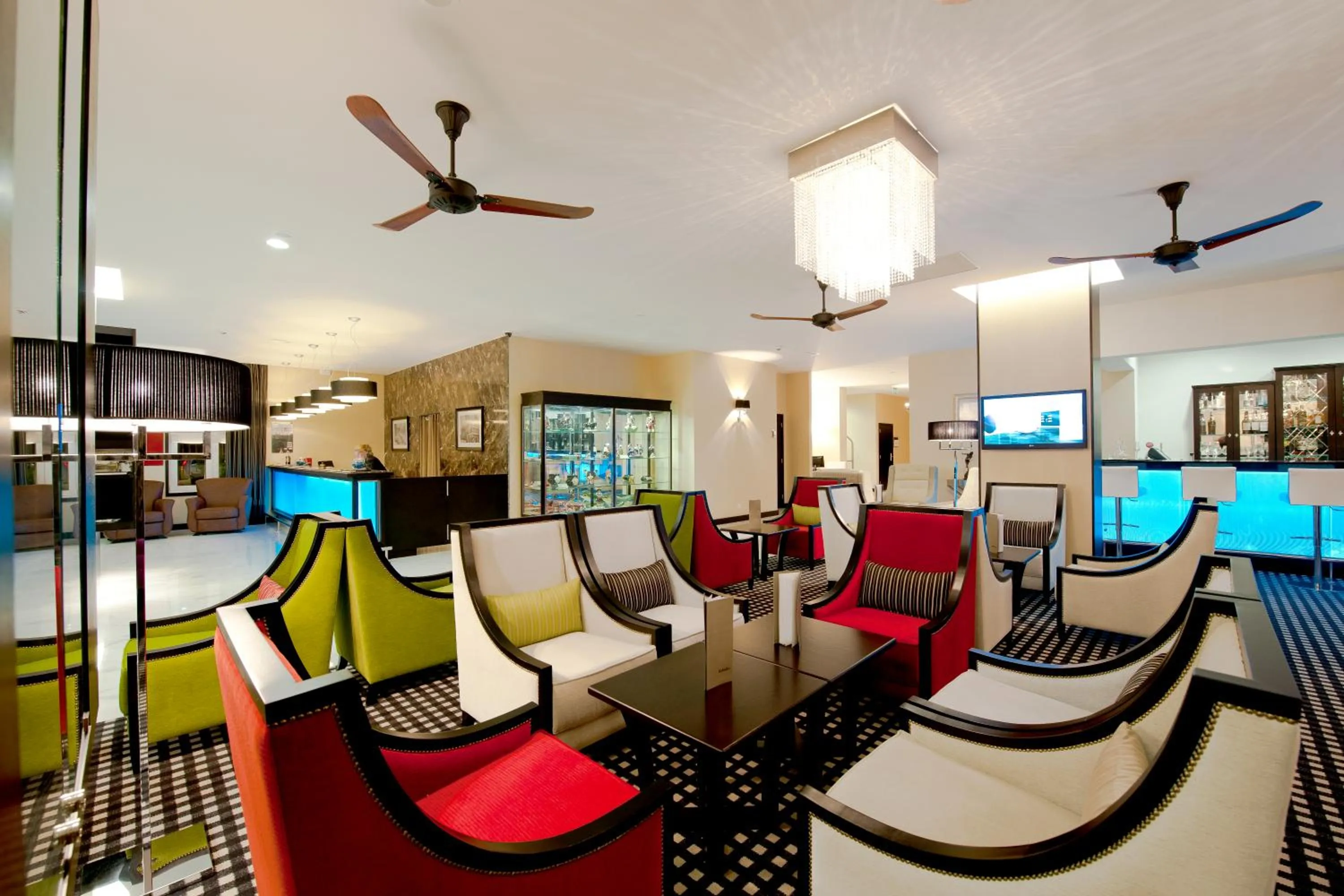 Communal lounge/ TV room in SANA Silver Coast Hotel