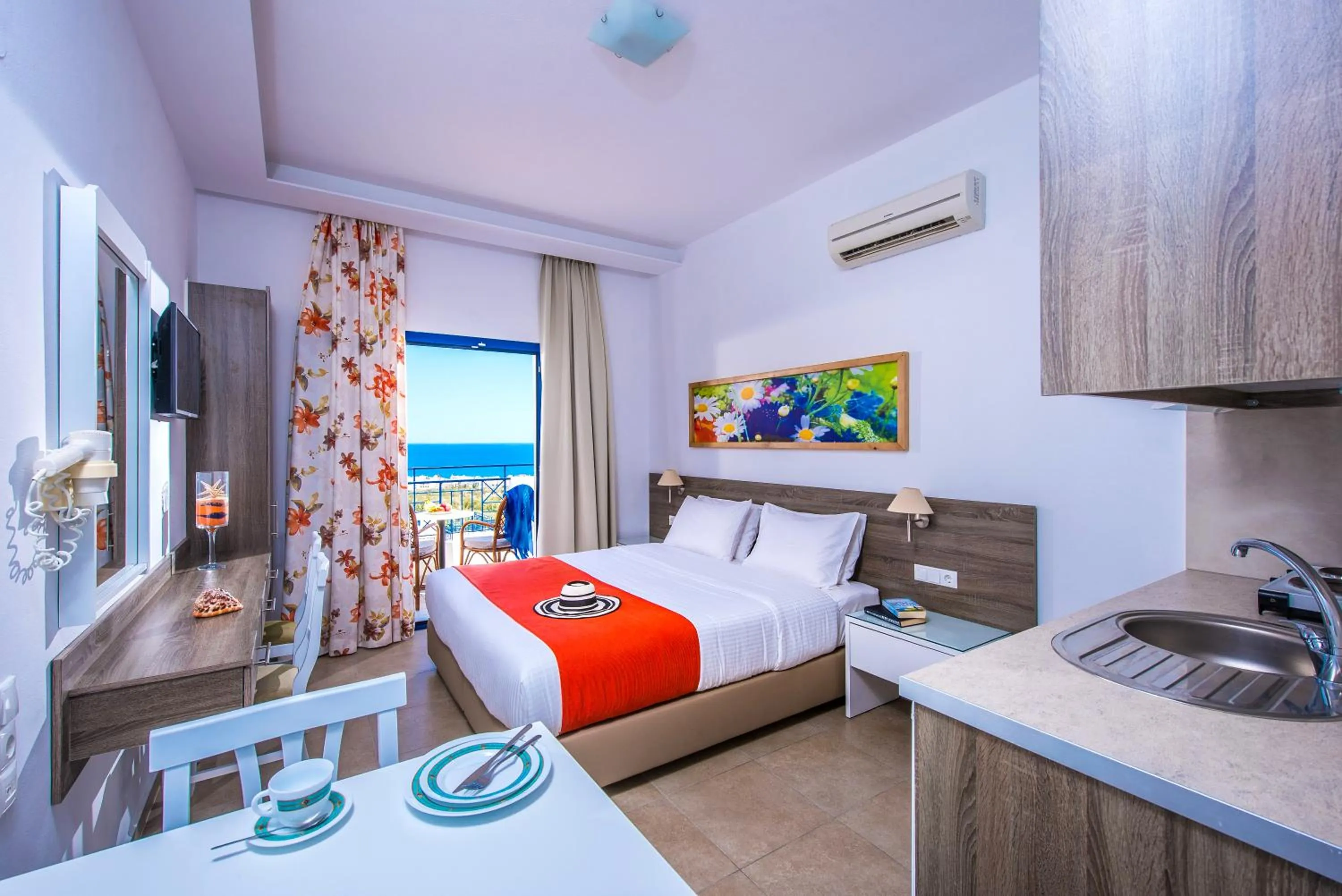 Bed in Astra Village & Suites