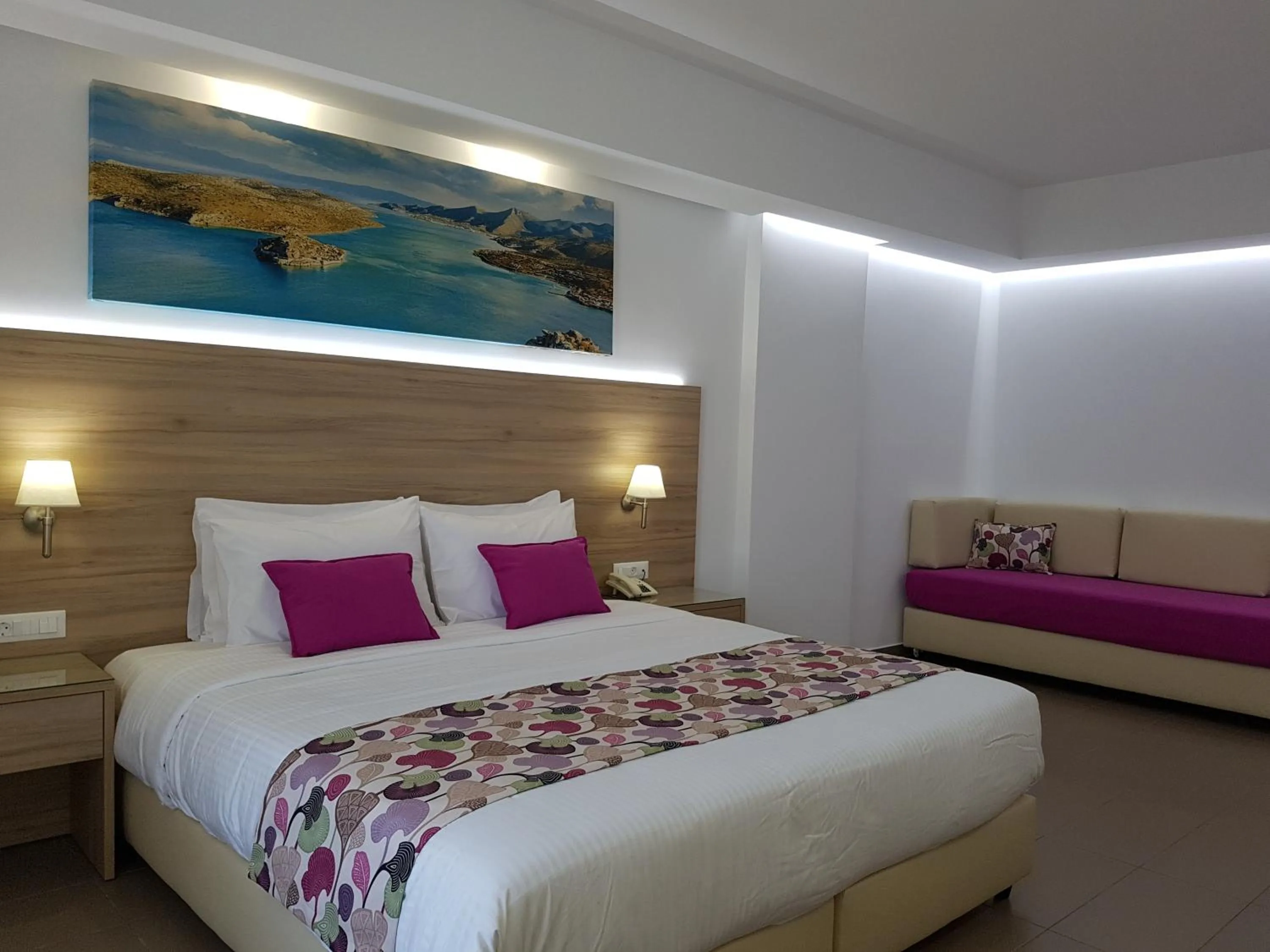 Bed in Astra Village & Suites