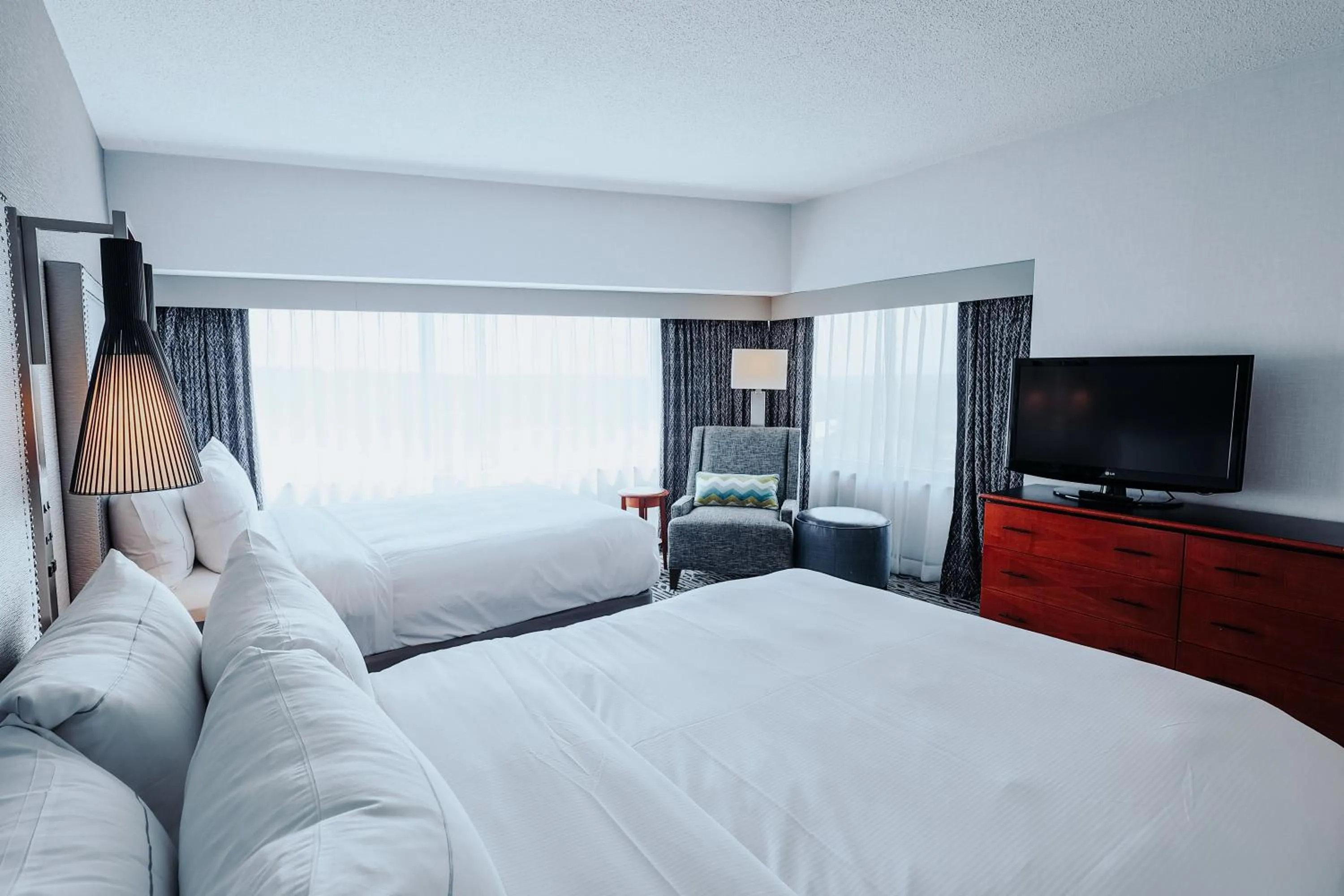 Bed in DoubleTree Suites by Hilton Hotel & Conference Center Chicago-Downers Grove