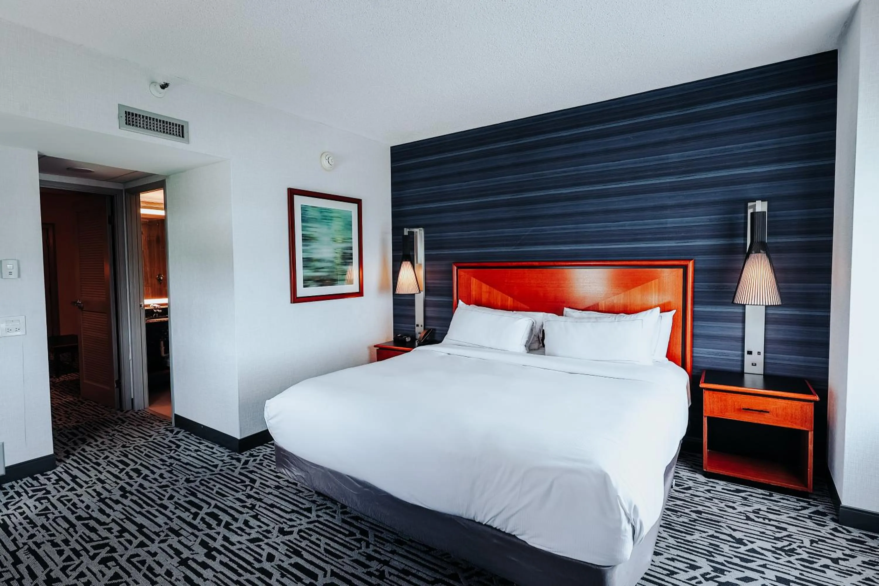 Bed in DoubleTree Suites by Hilton Hotel & Conference Center Chicago-Downers Grove