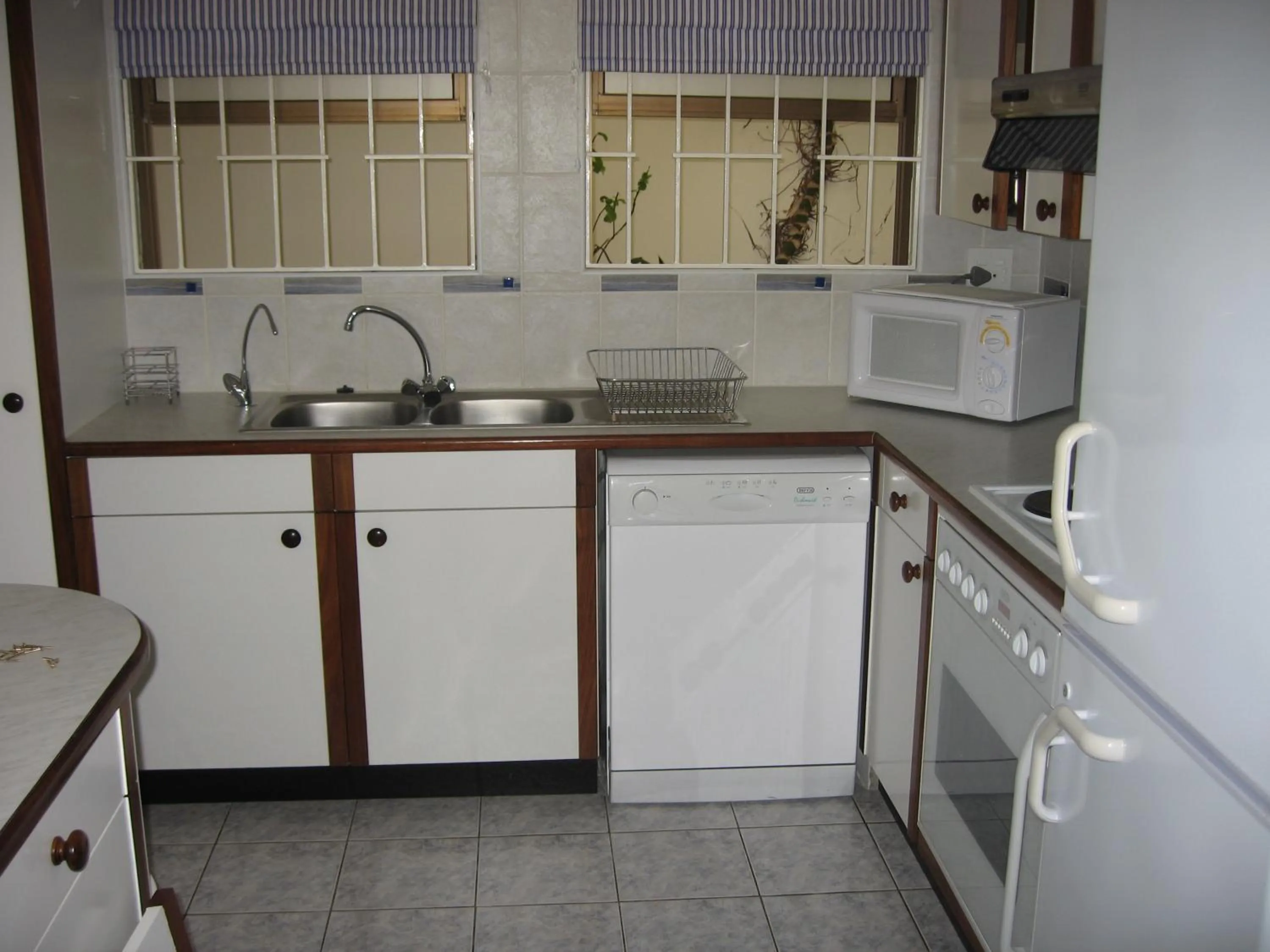 Kitchen or kitchenette in An Der Mole Apartment