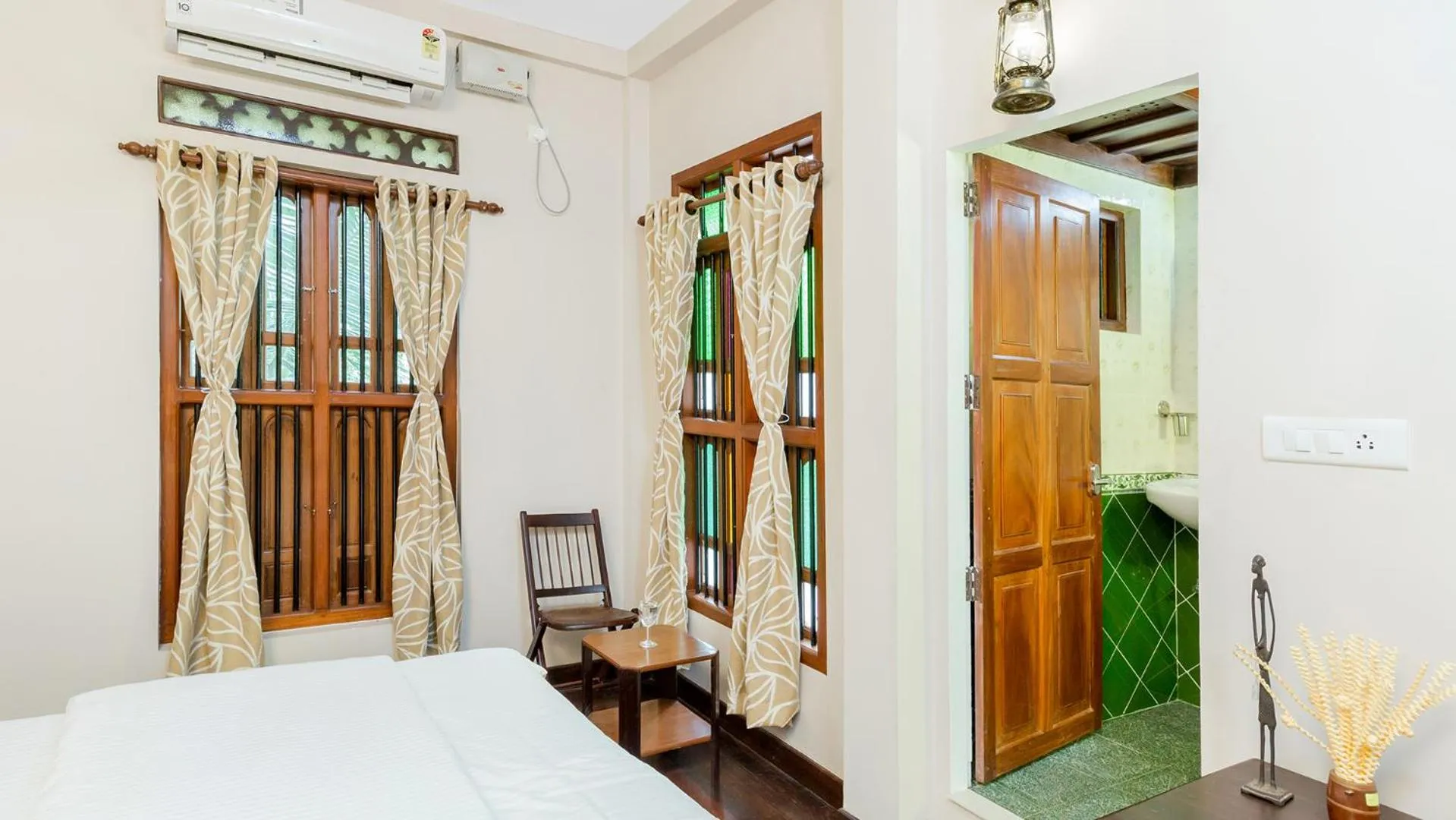 Bed in Kumarakom Wood Castle Serviced Appartments