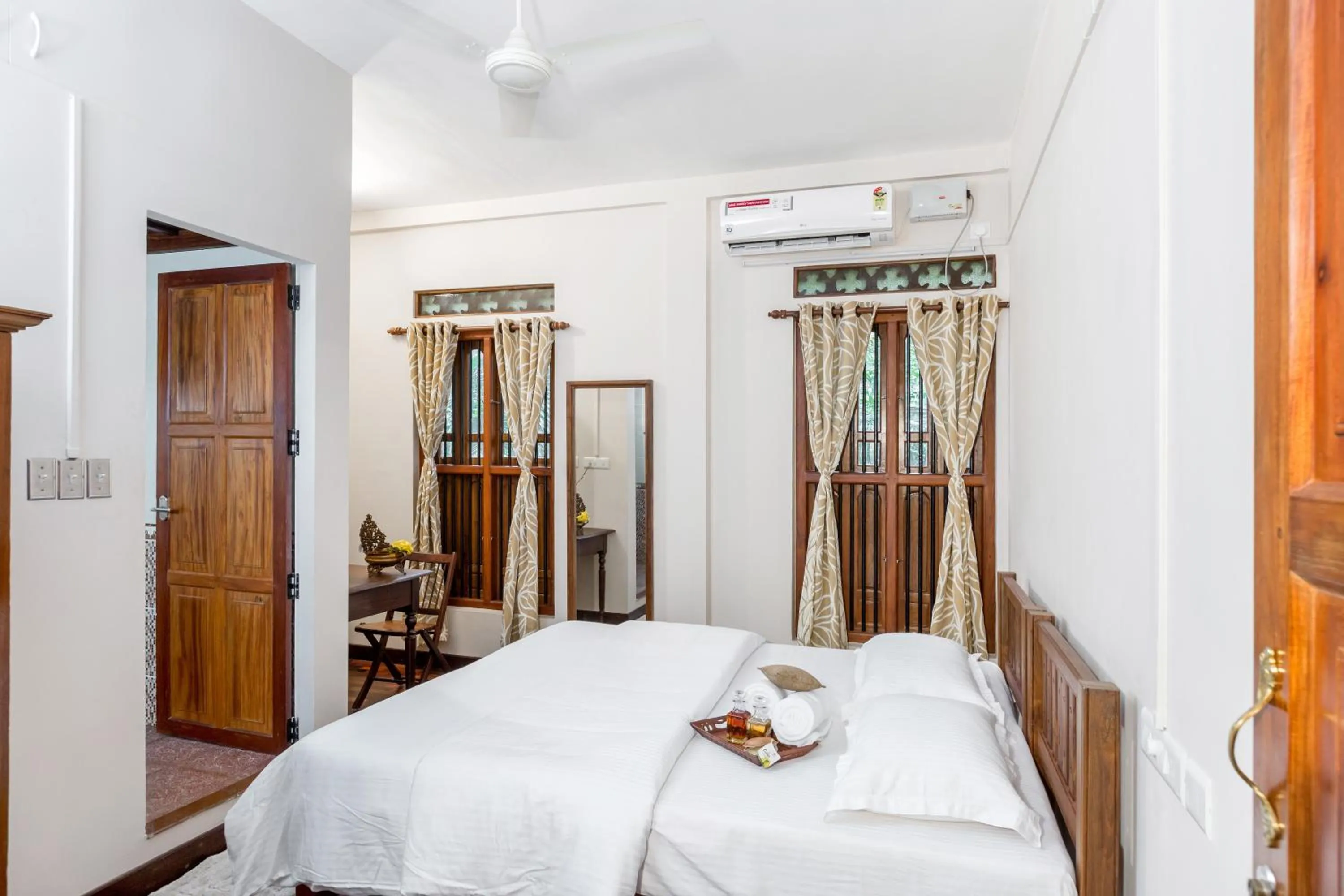Bed in Kumarakom Wood Castle Serviced Appartments