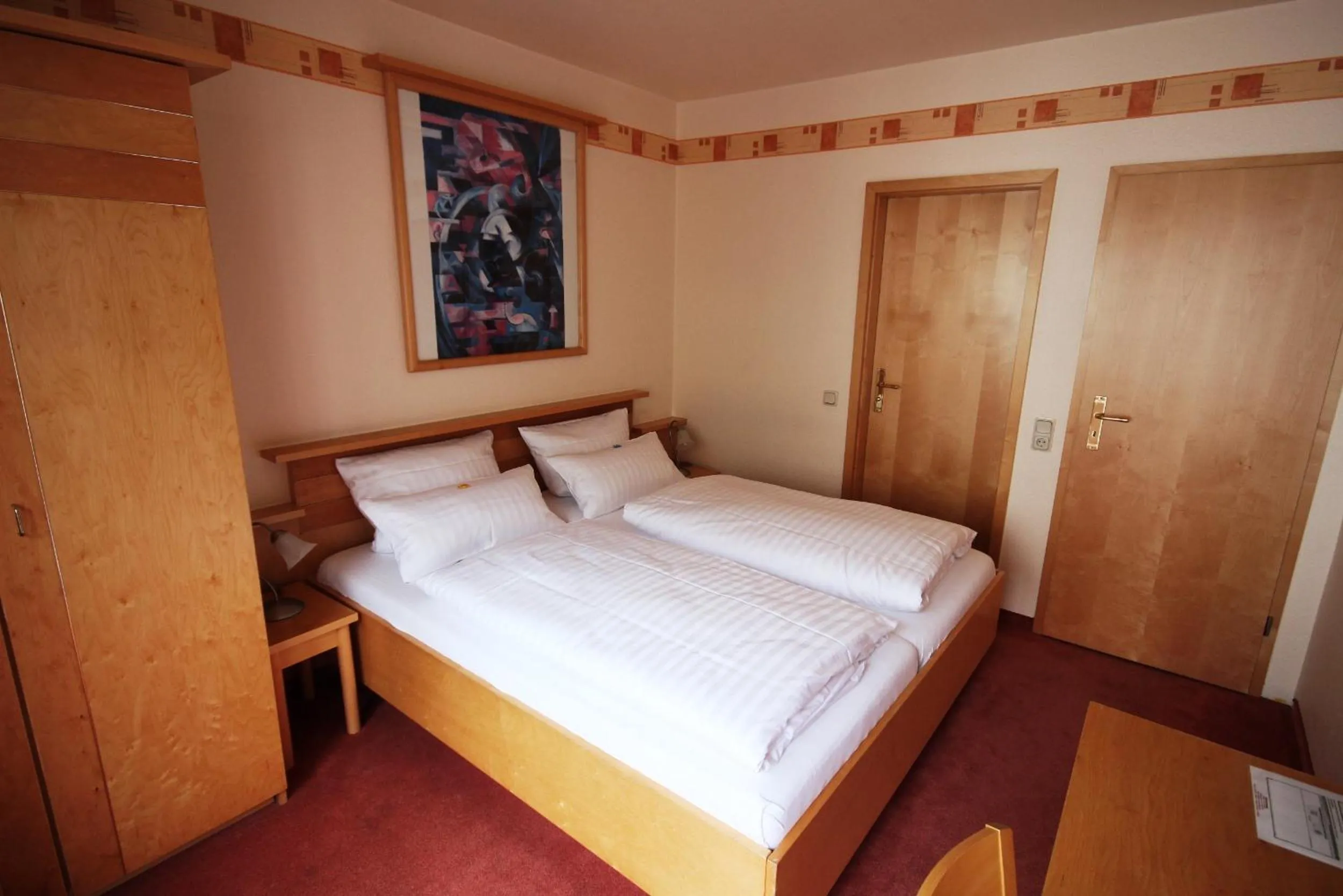 Photo of the whole room, Bed in Hotel Glockengasse