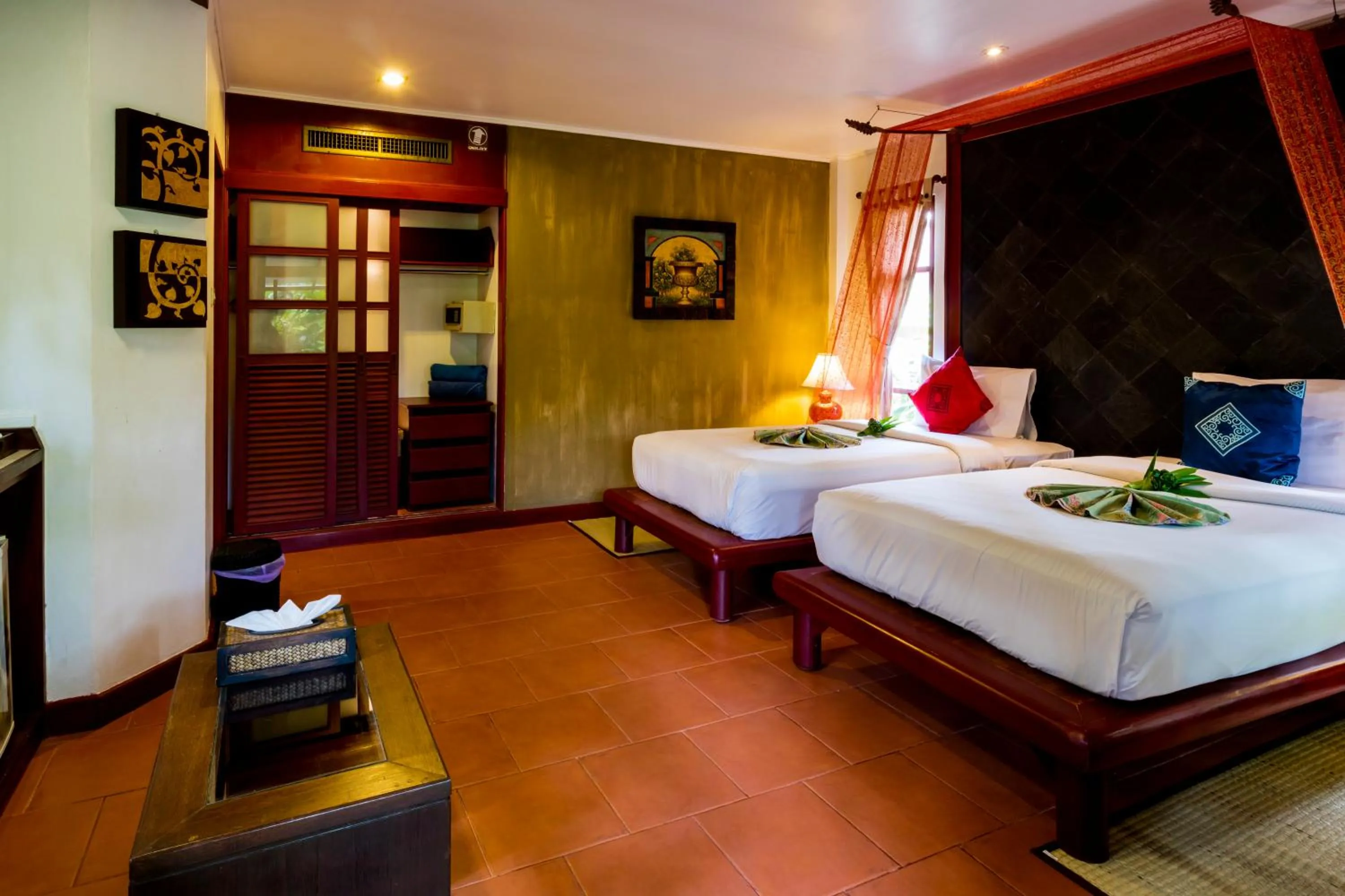 Bed in Bangtao Beach Chalet Resort
