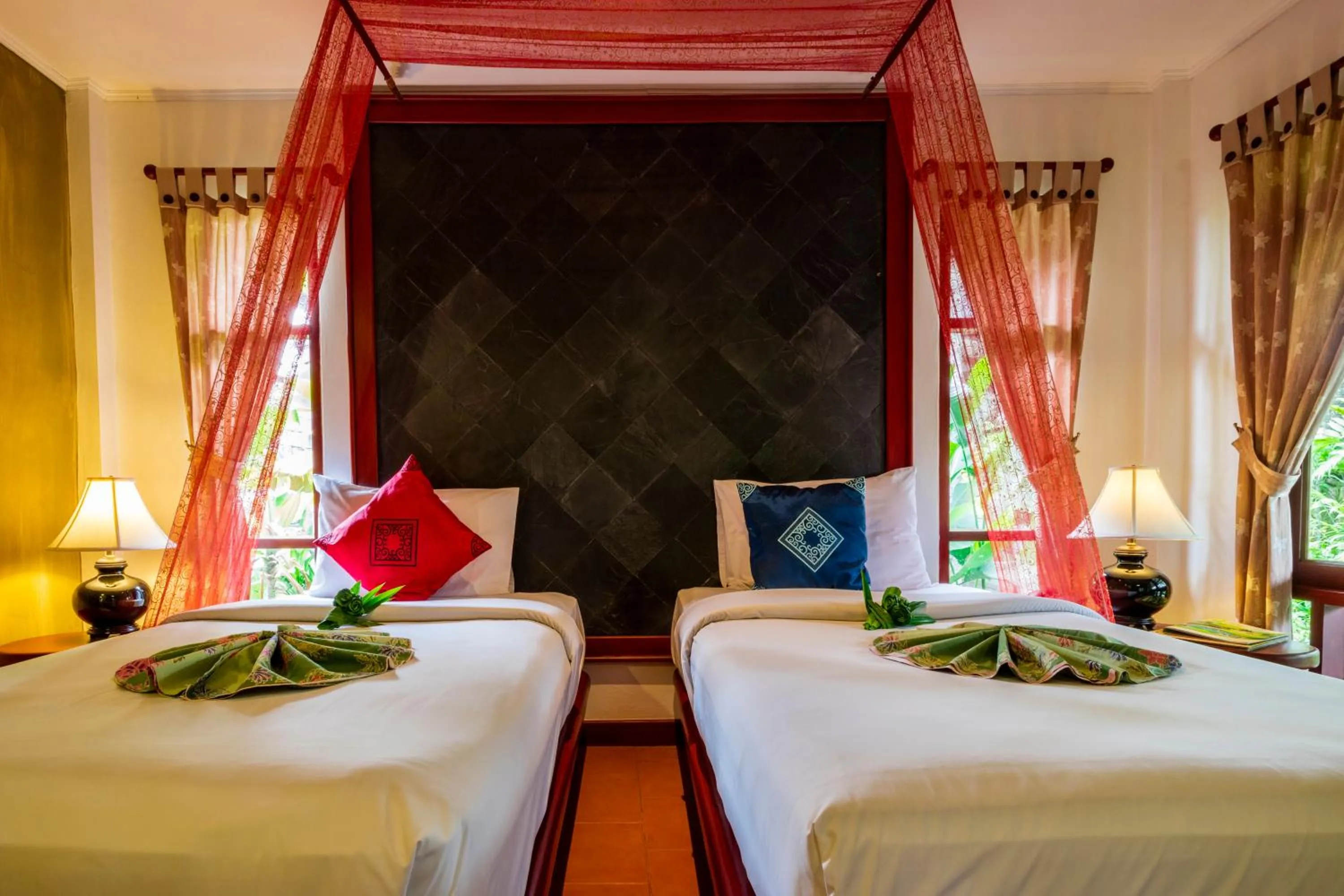 Bed in Bangtao Beach Chalet Resort