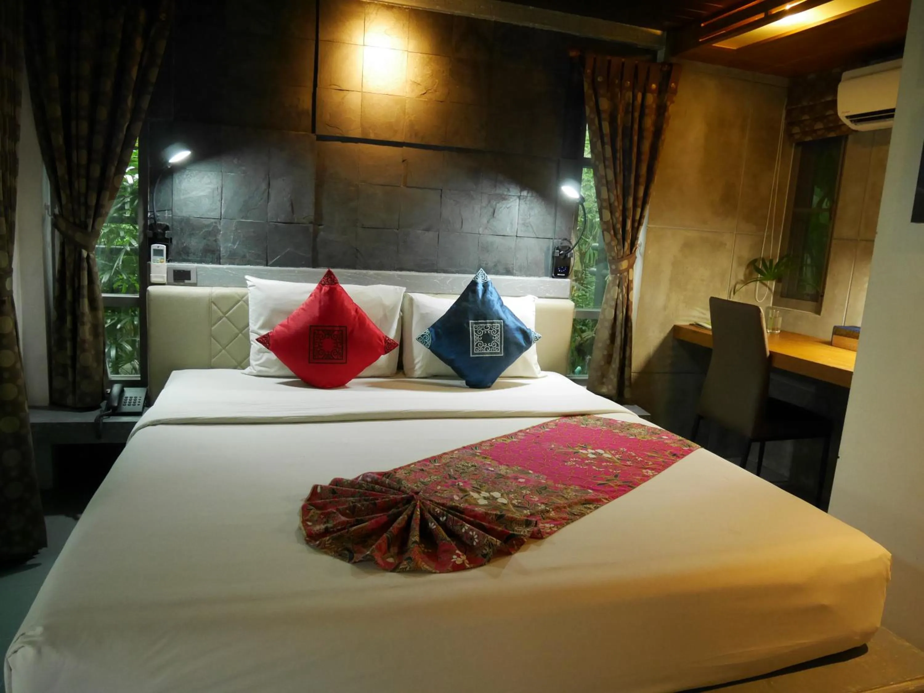 Bed in Bangtao Beach Chalet Resort