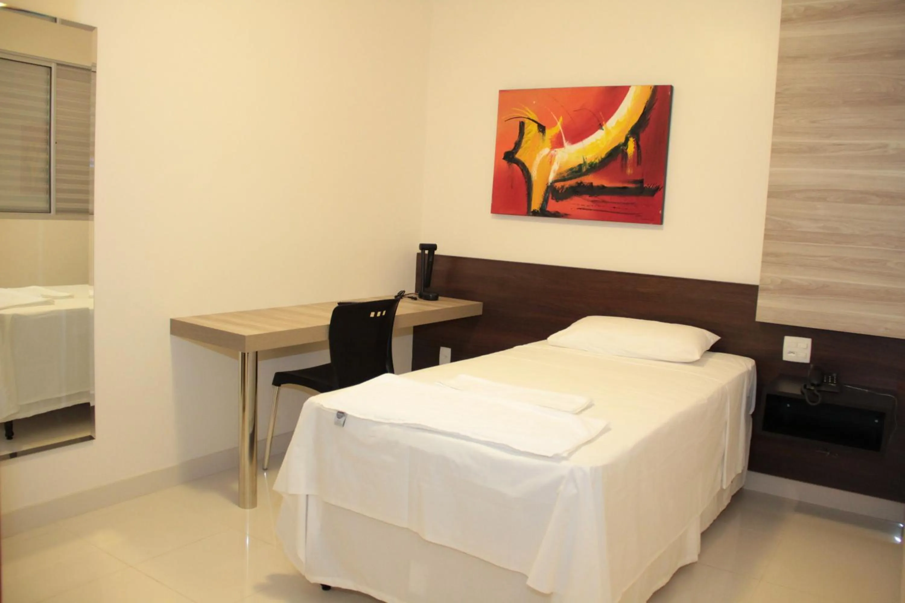 Bed in Executivo Hotel