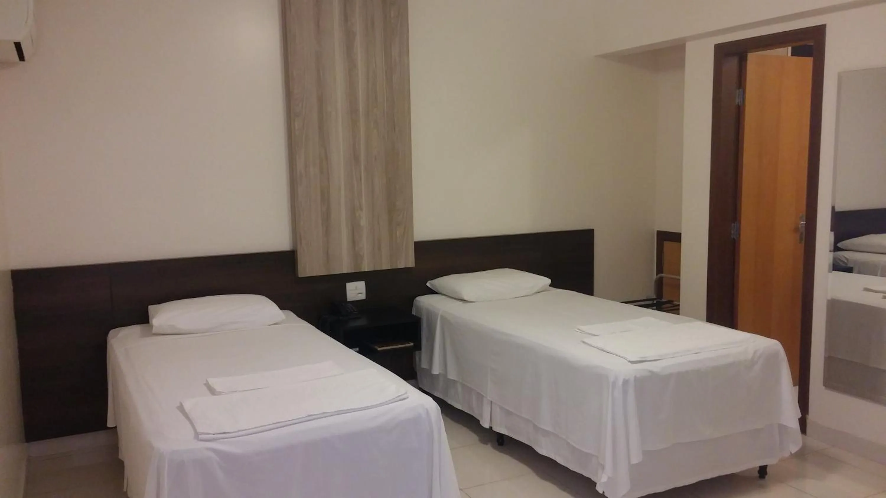 Bed in Executivo Hotel