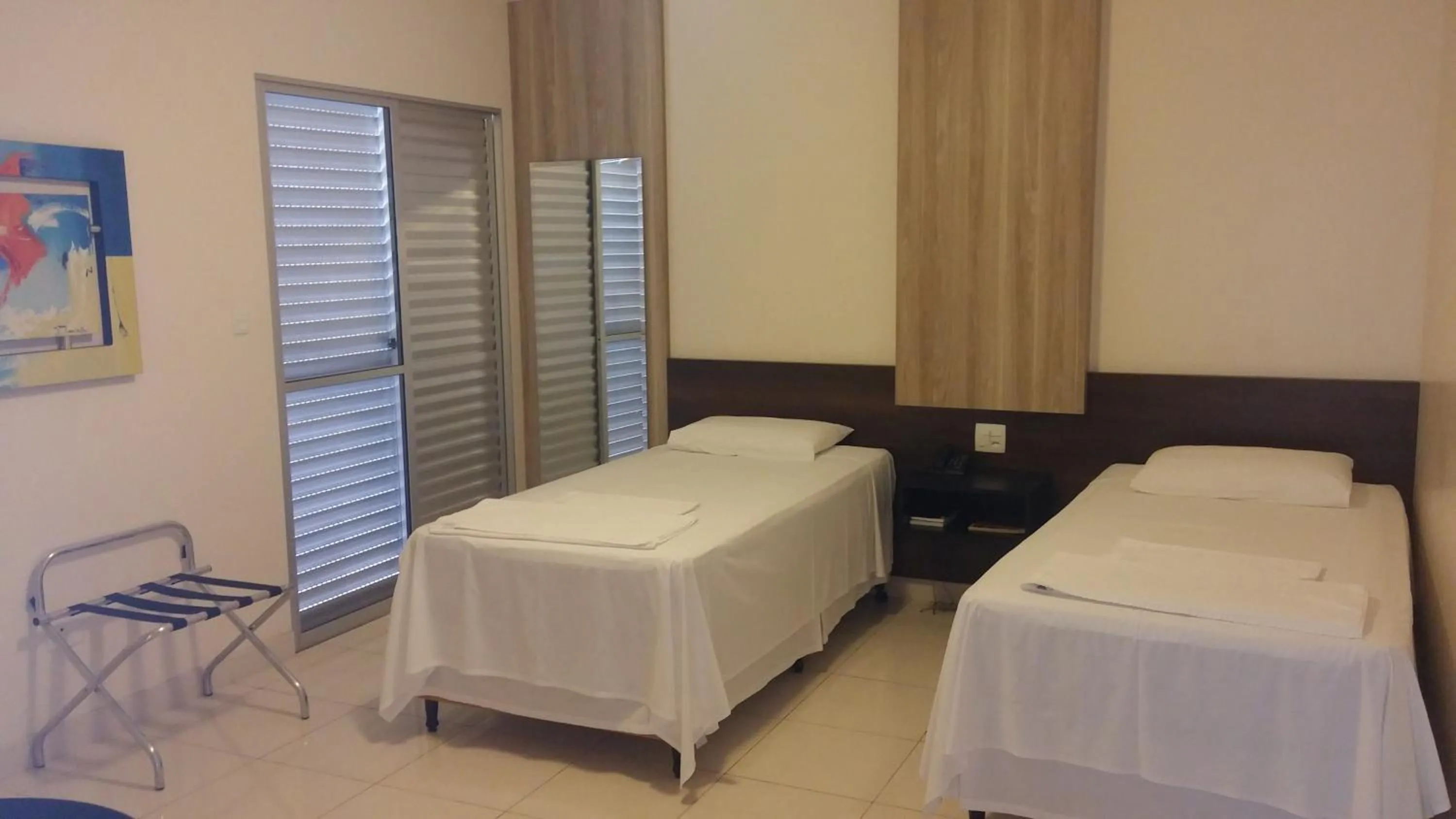 Bed in Executivo Hotel