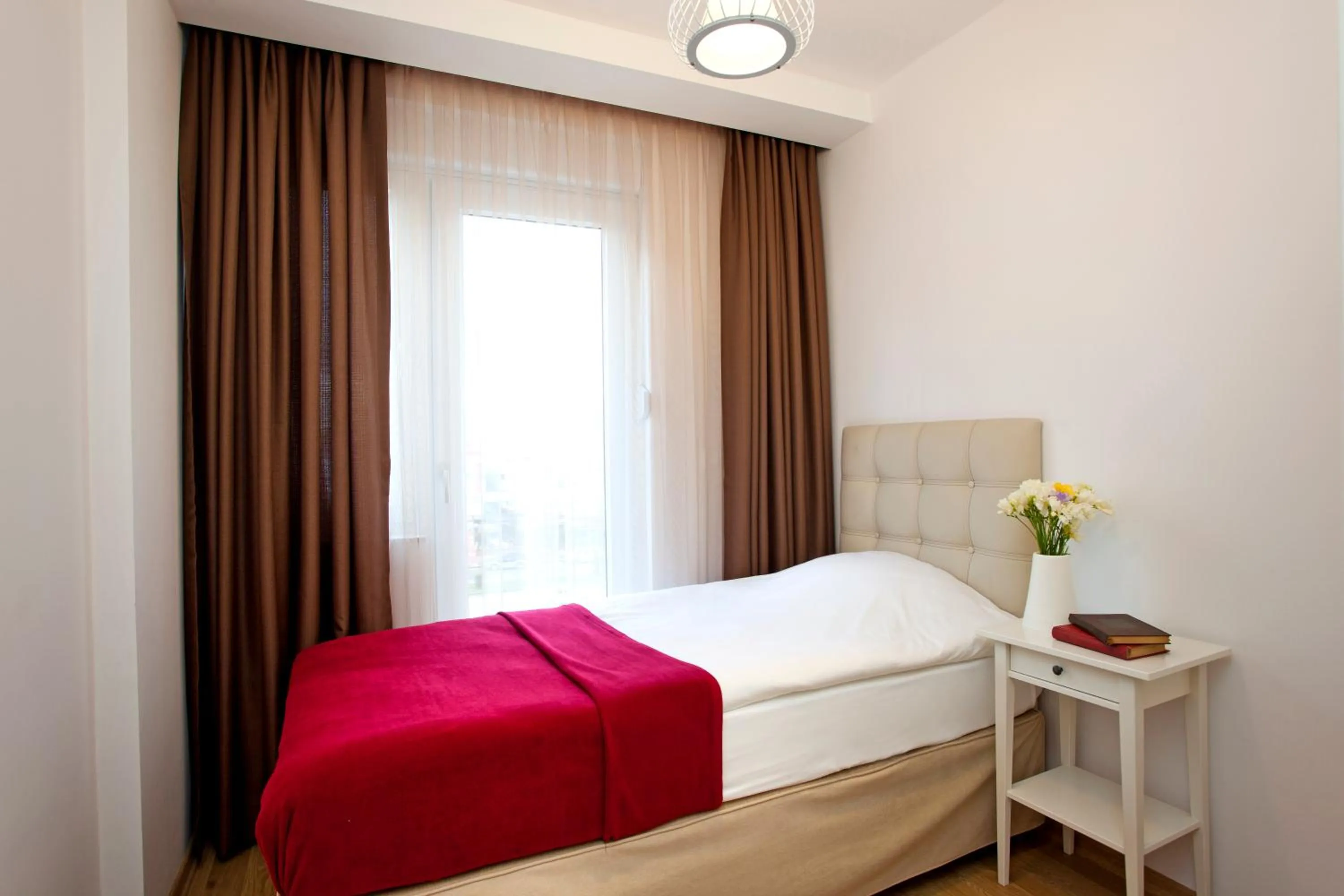 Bed in The Room Hotel & Apartments