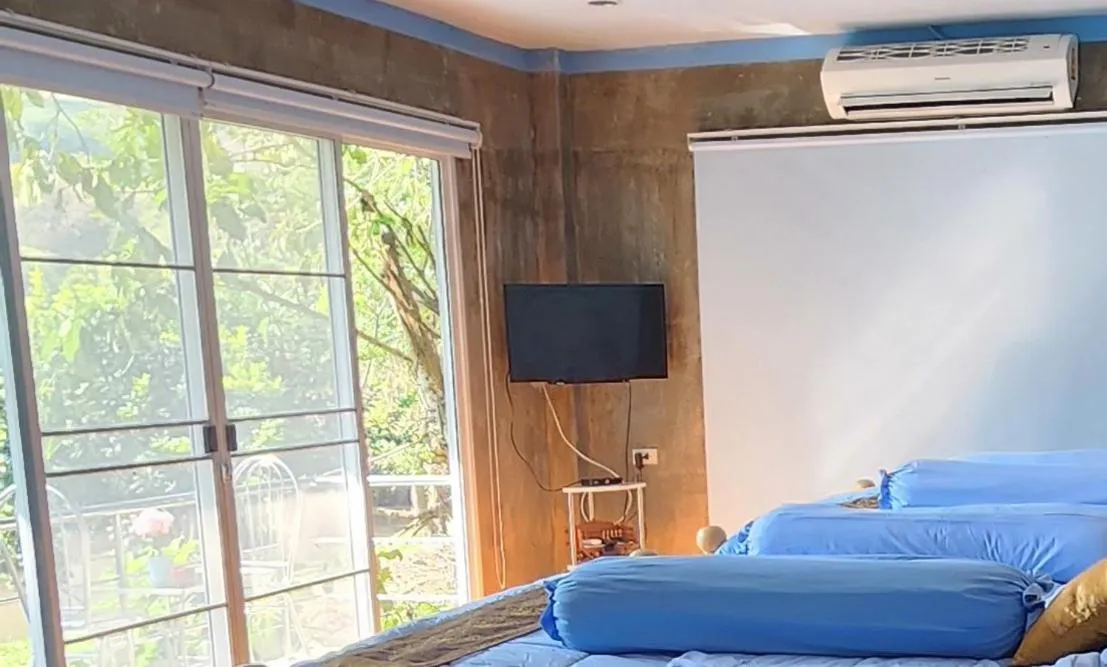 Bed in Rimtharnn Homestay Maewin