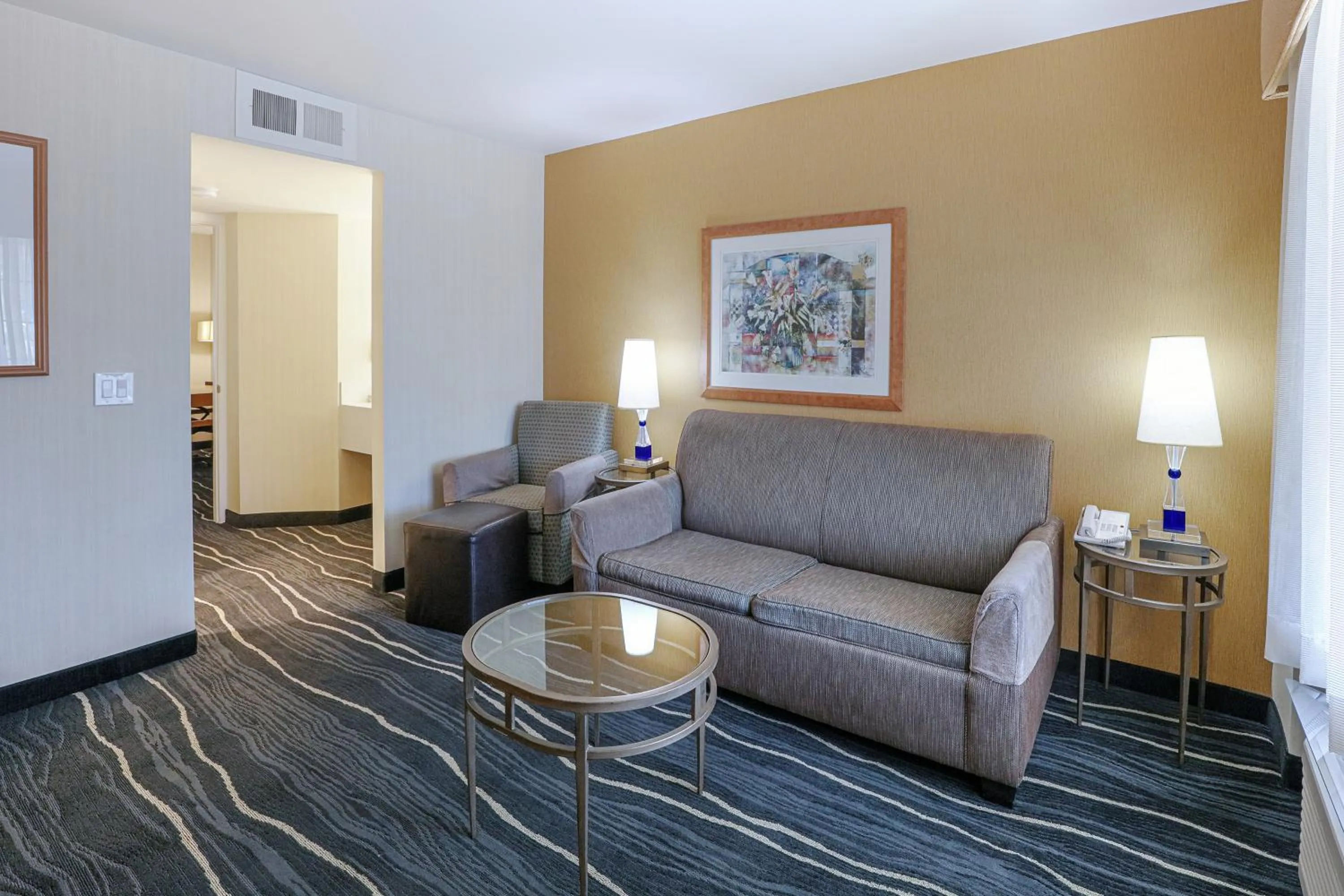 Living room in Ramada by Wyndham Costa Mesa/Newport Beach
