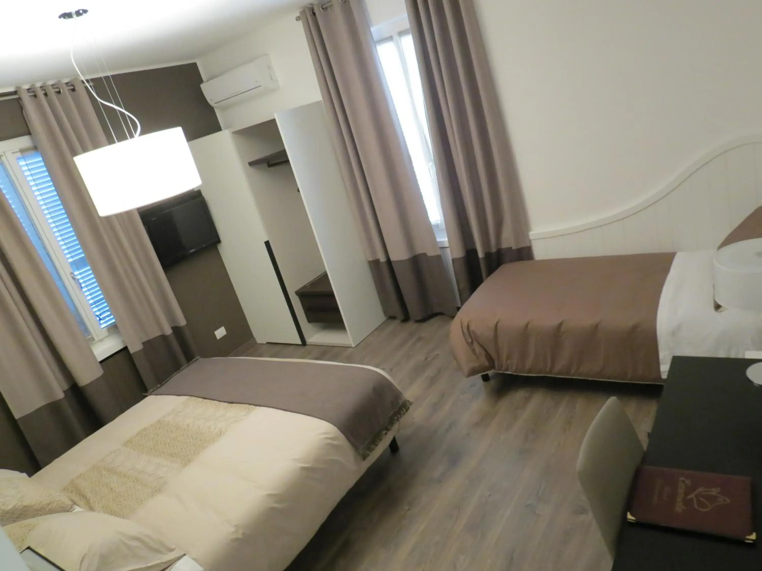 Triple Room in Hotel Ristorante Eurossola Triple Room in Hotel Ristorante Eurossola