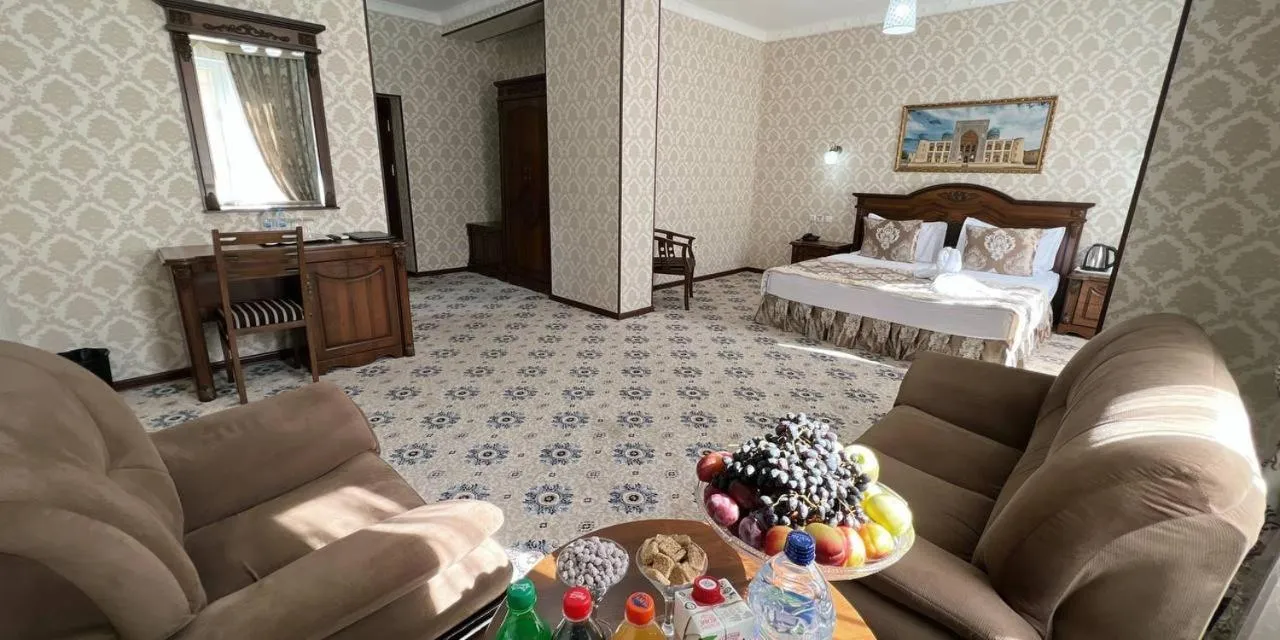 Bed in Hotel Asia Bukhara