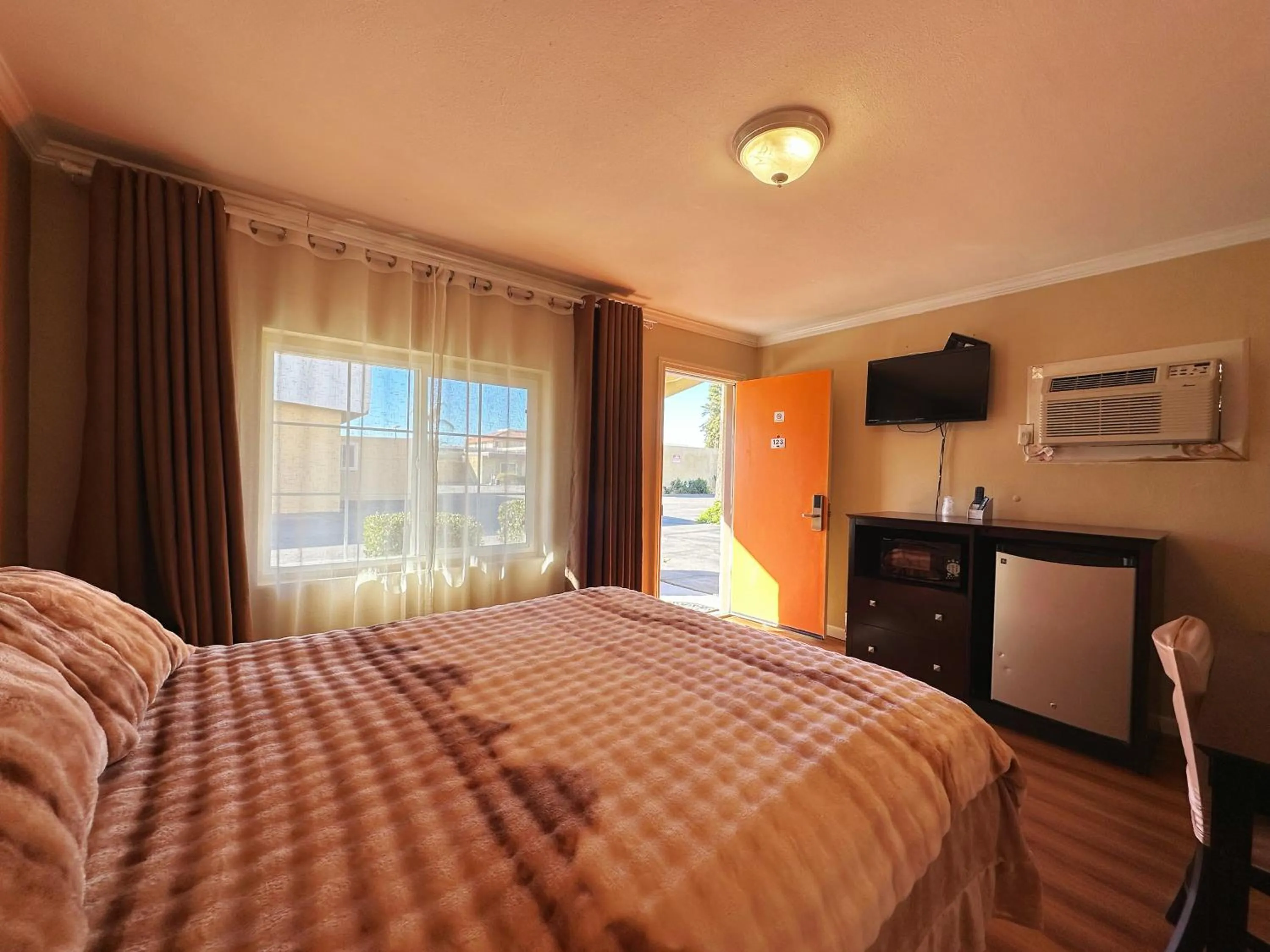 Bed in Royal Inn and Suites