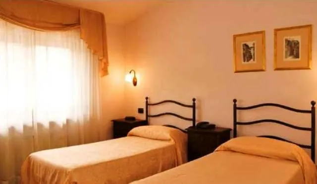 Bed in Dominus Hotel