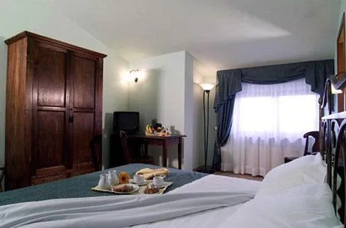 Bed in Dominus Hotel