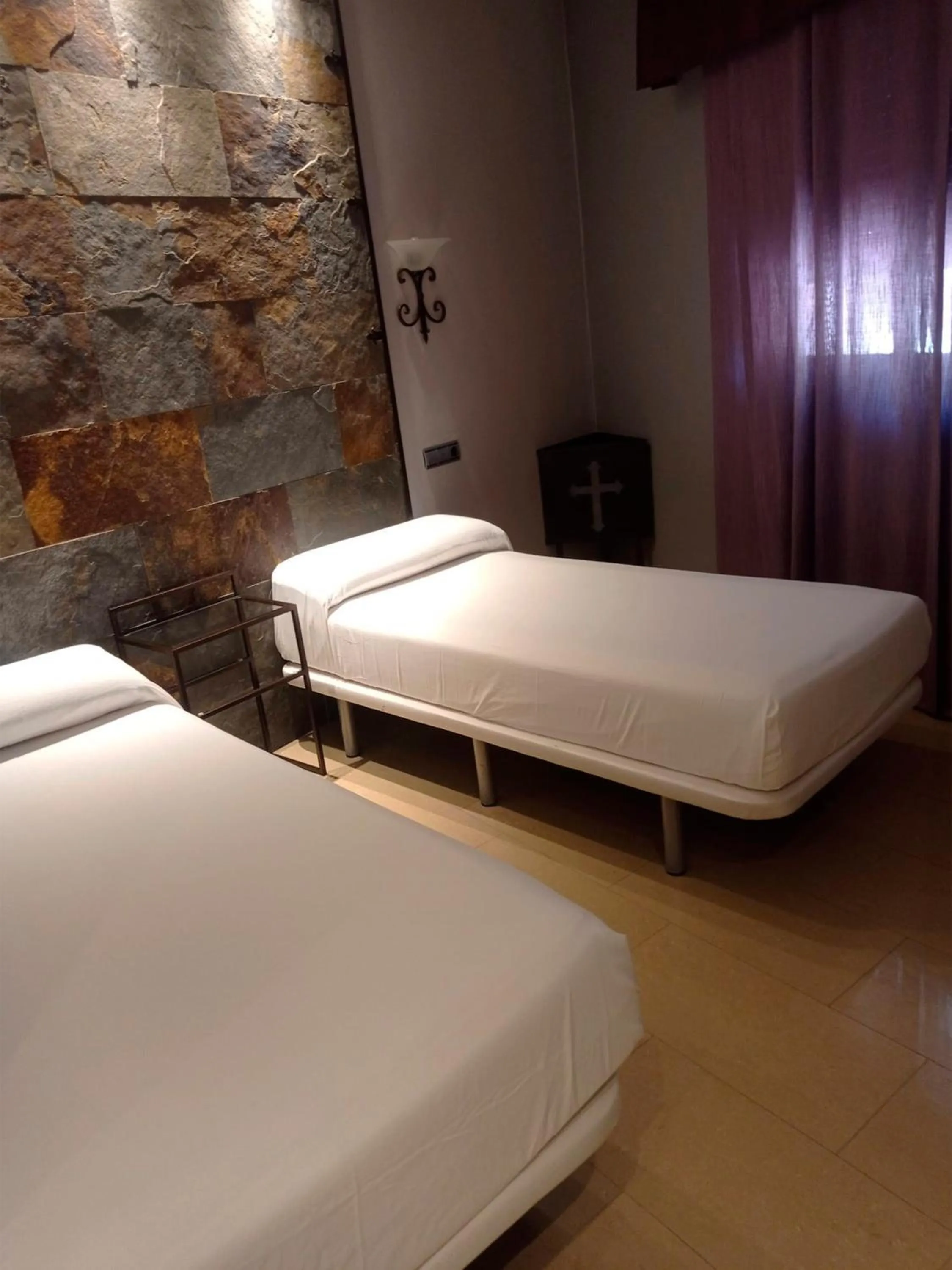 Bed in Hotel La Brasa