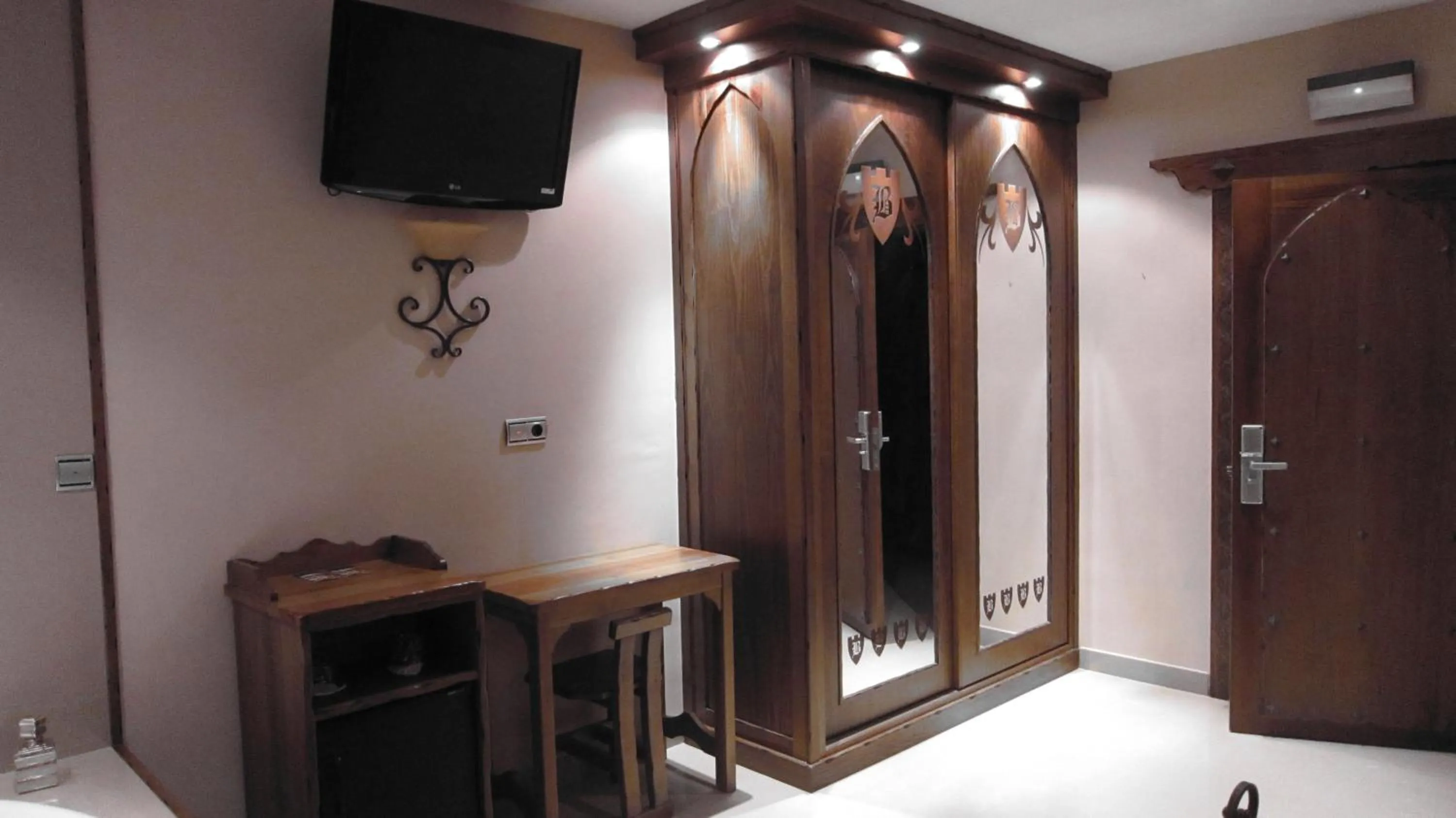 Decorative detail, TV/Entertainment Center in Hotel La Brasa