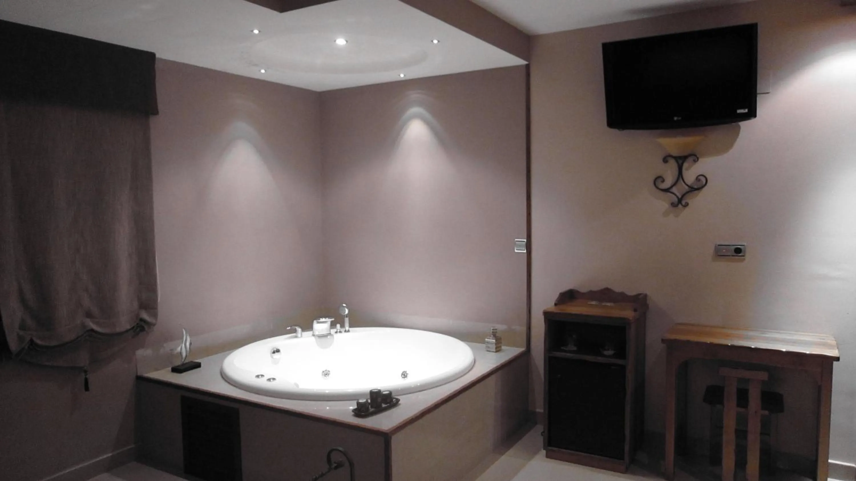 Decorative detail, TV/Entertainment Center in Hotel La Brasa