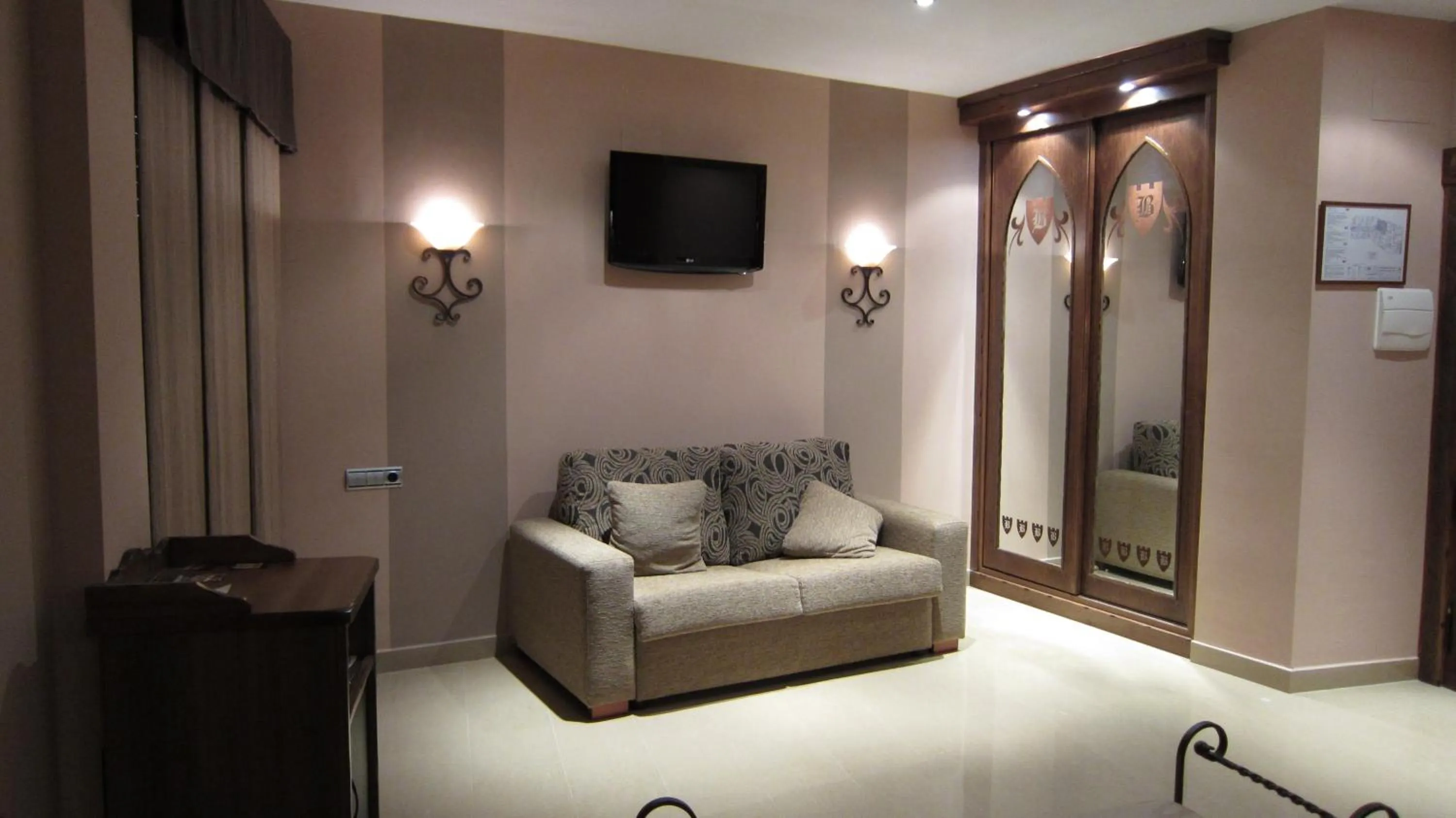 Photo of the whole room, Seating Area in Hotel La Brasa