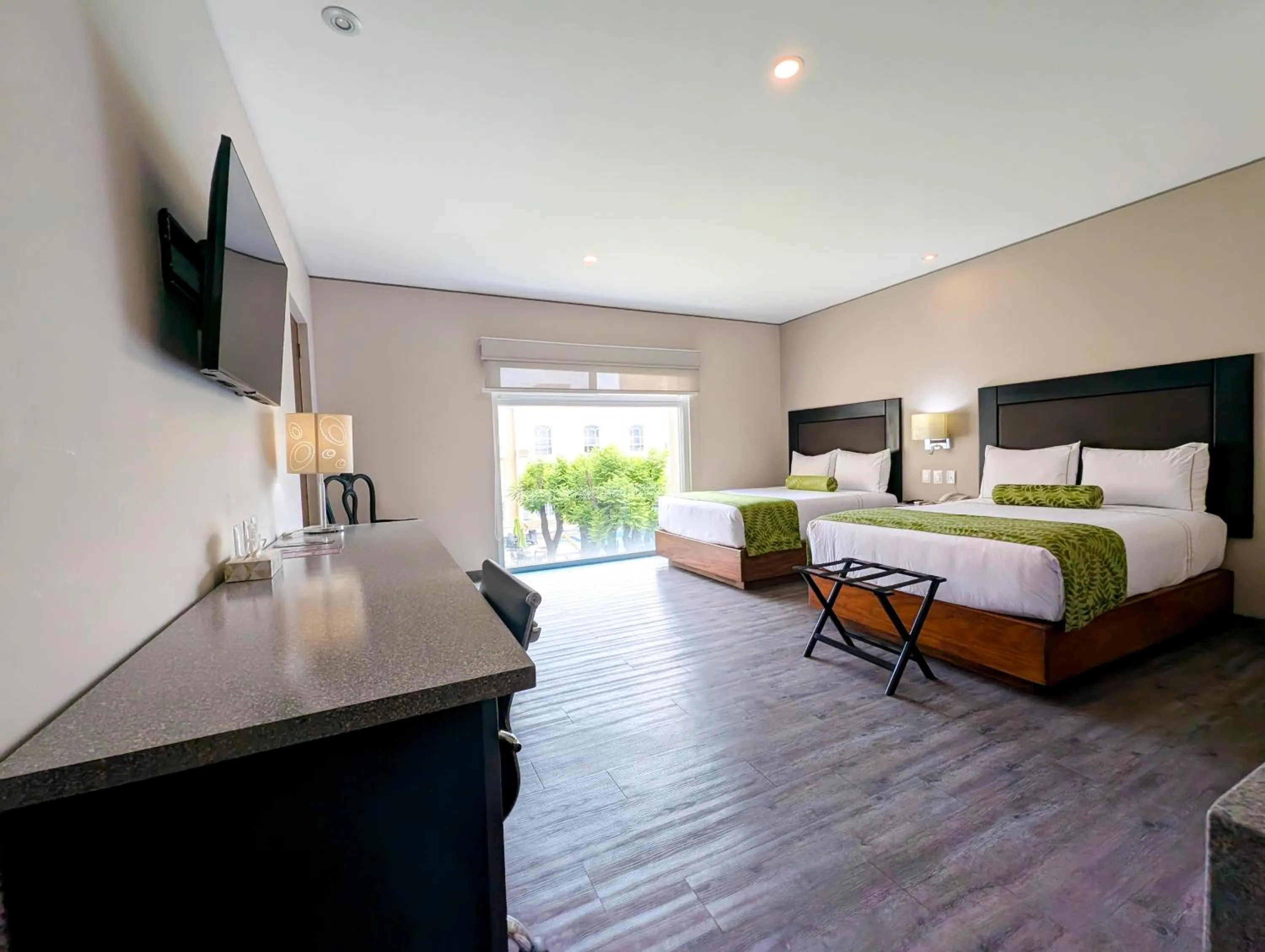 Guests, Bed in Plaza Camelinas Hotel