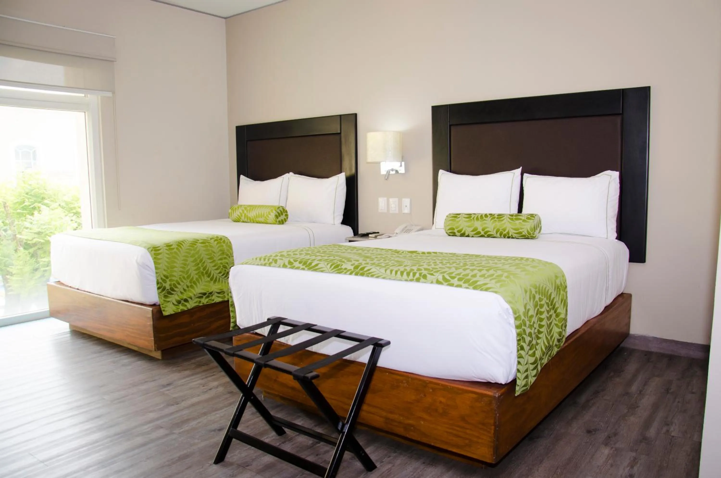 Bed in Plaza Camelinas Hotel