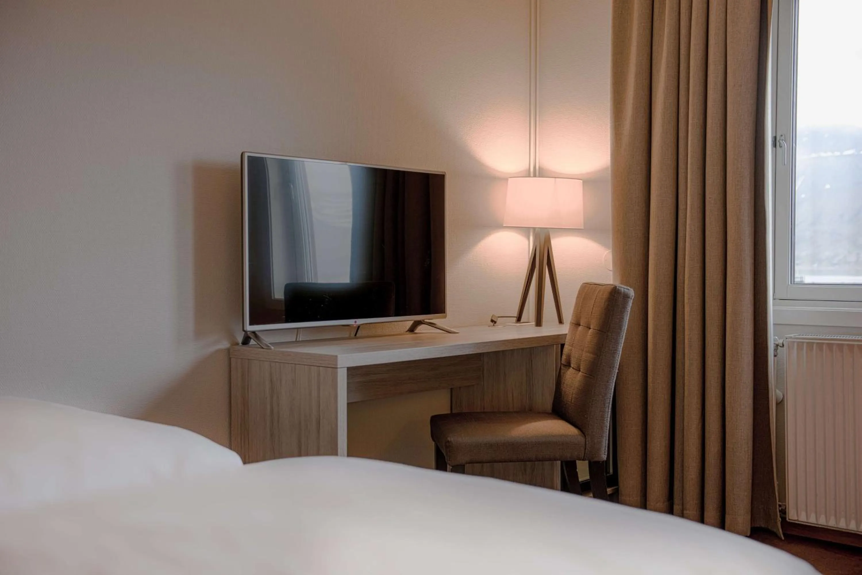 Photo of the whole room, Bed in Radisson Blu Polar Hotel, Spitsbergen