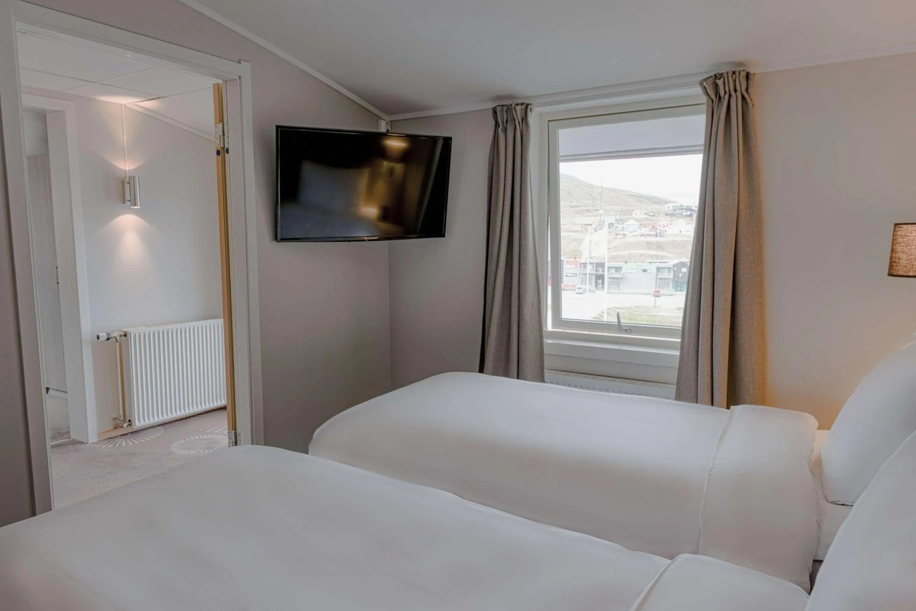 Photo of the whole room, Bed in Radisson Blu Polar Hotel, Spitsbergen