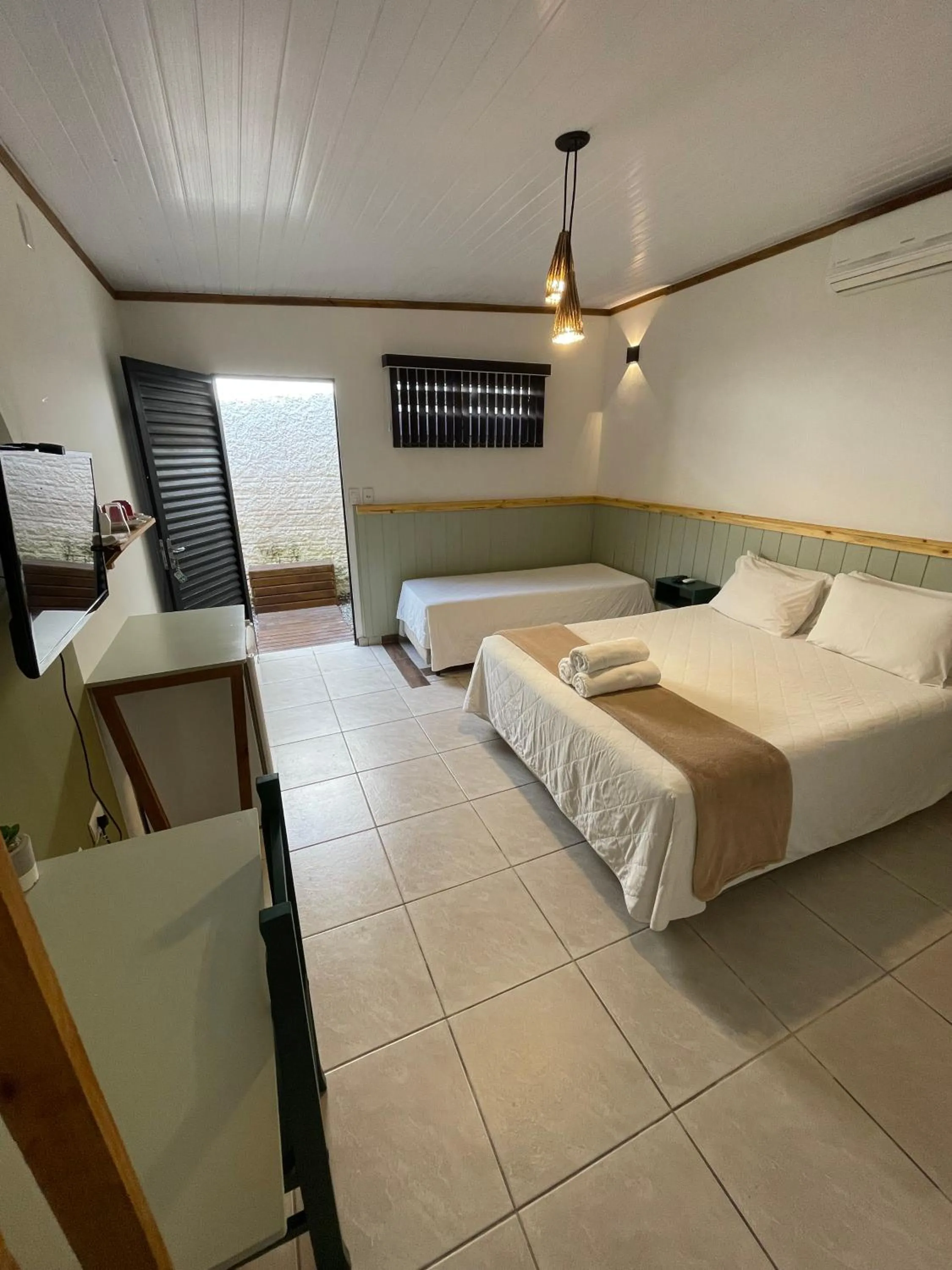 Bed in Pousada Ilha da Magia