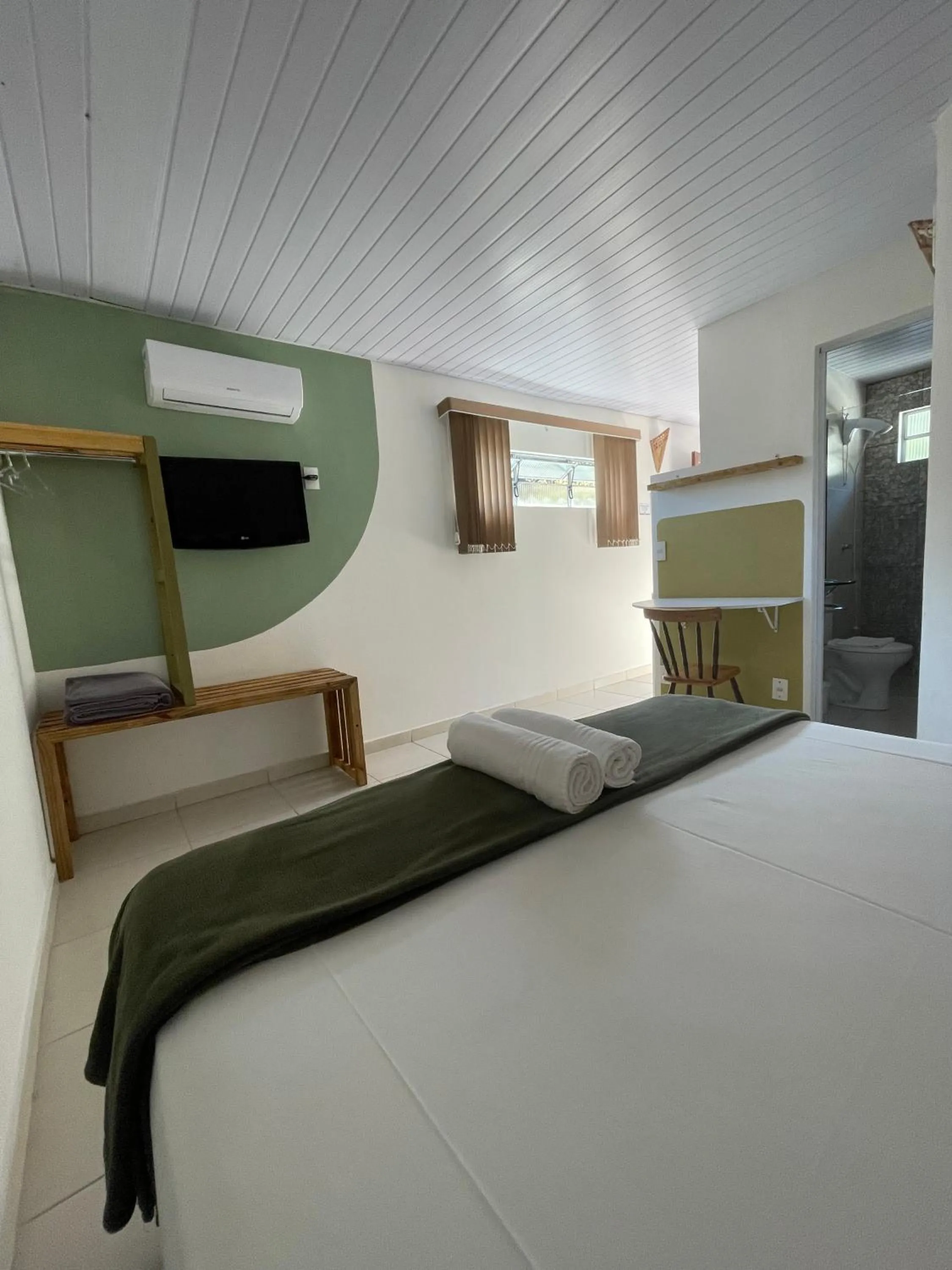 Bed in Pousada Ilha da Magia