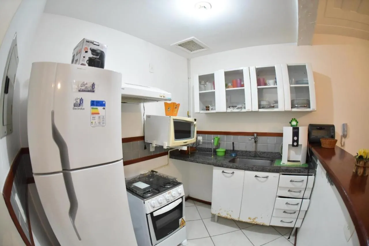 Kitchen or kitchenette in Apart Hotel em Búzios
