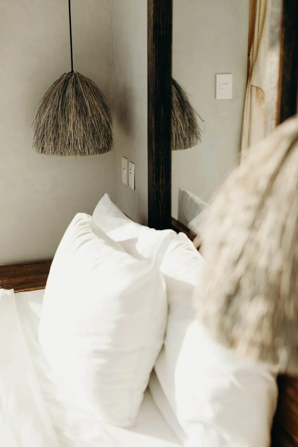 Bed in Mamasan Treehouses & Cabins