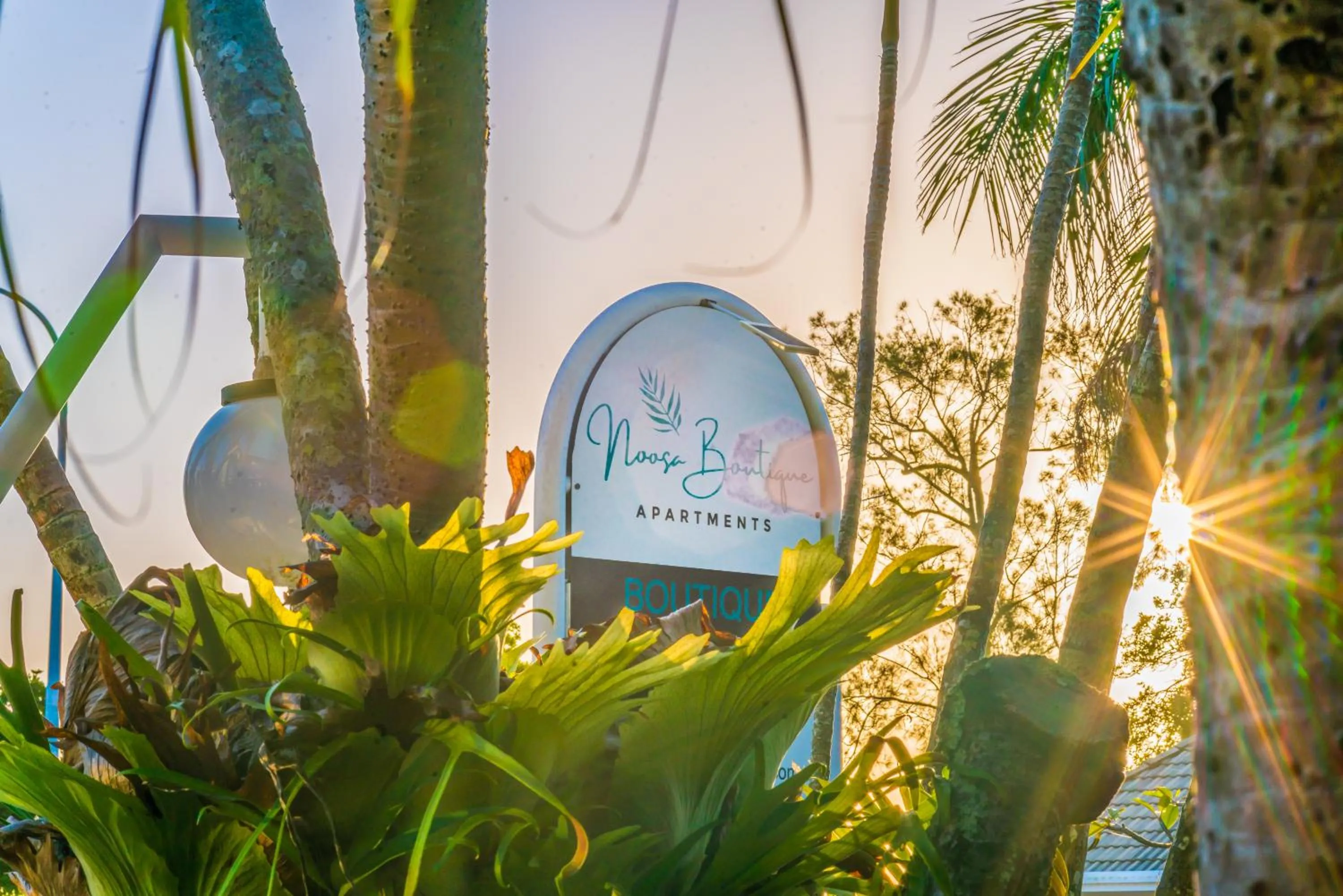 Property logo or sign in Noosa Boutique Apartments & Elkhorn Villas