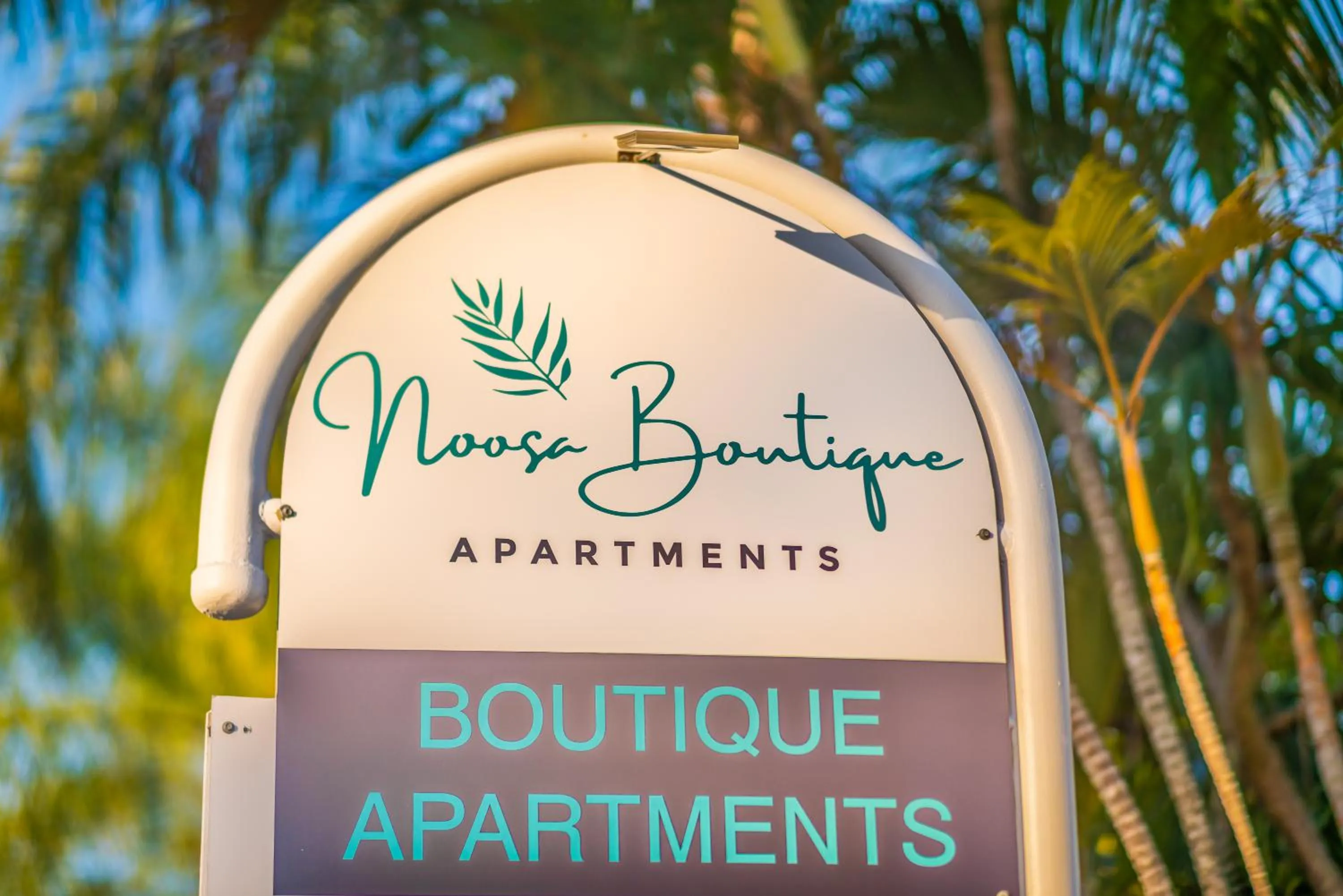 Property logo or sign in Noosa Boutique Apartments & Elkhorn Villas