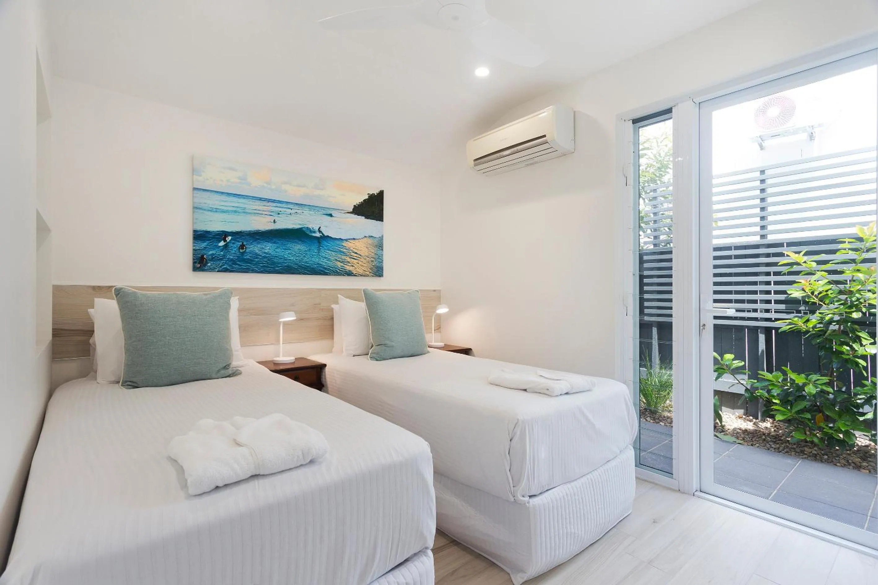 Bed in Noosa Boutique Apartments & Elkhorn Villas