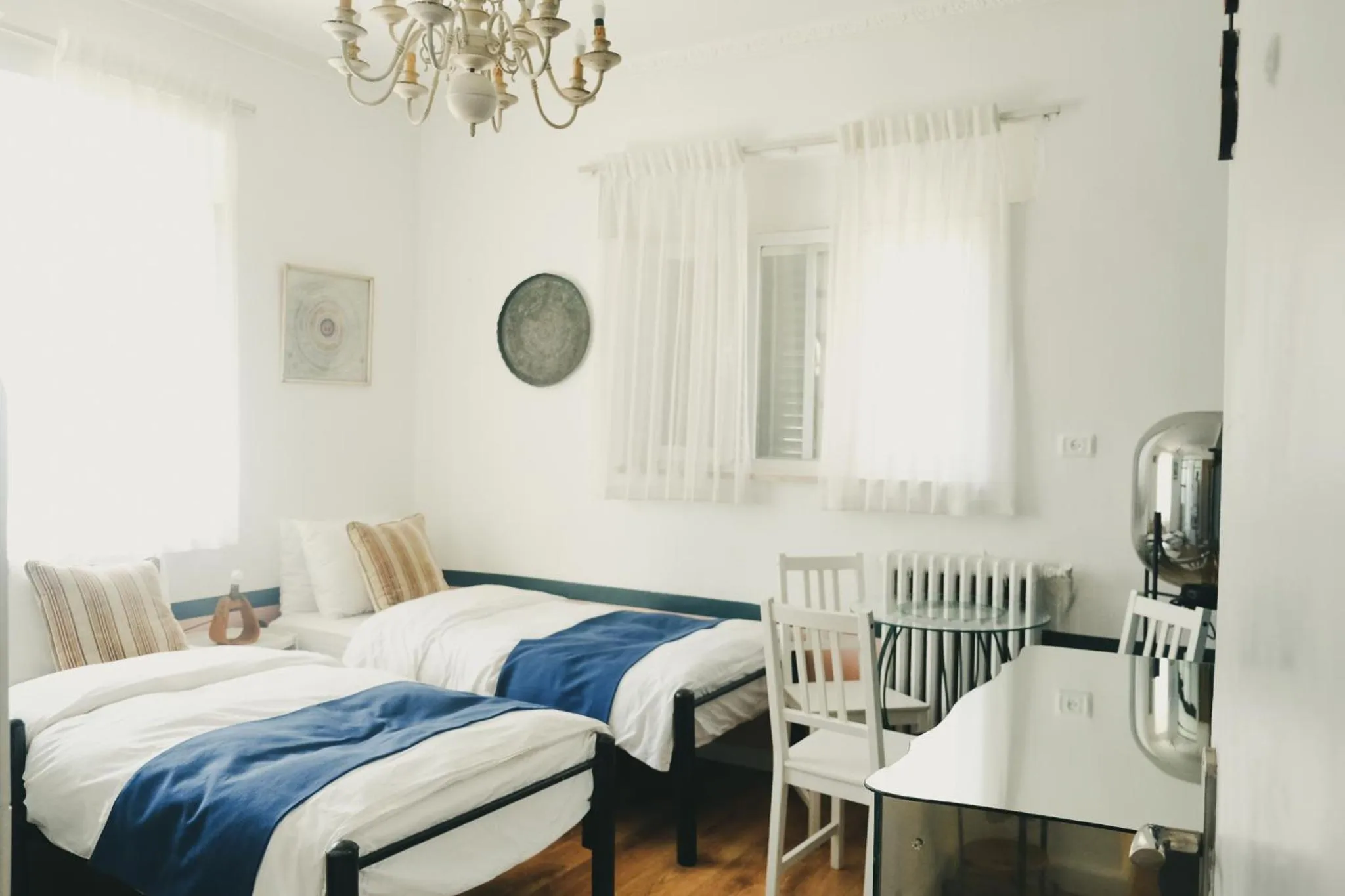 Seating area, Bed in Tzefania Hotel