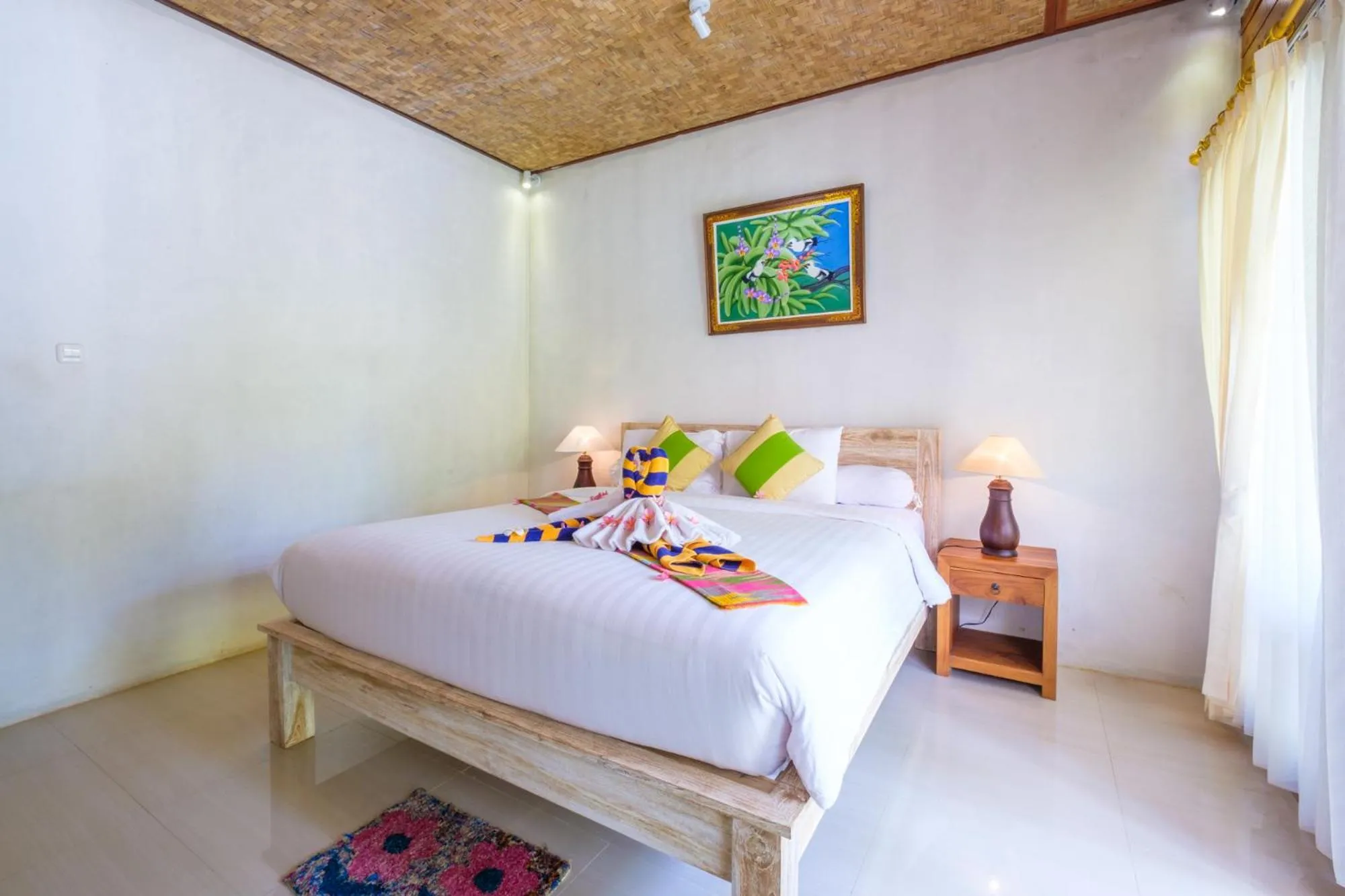 Bed in Crystal Bay Bungalows