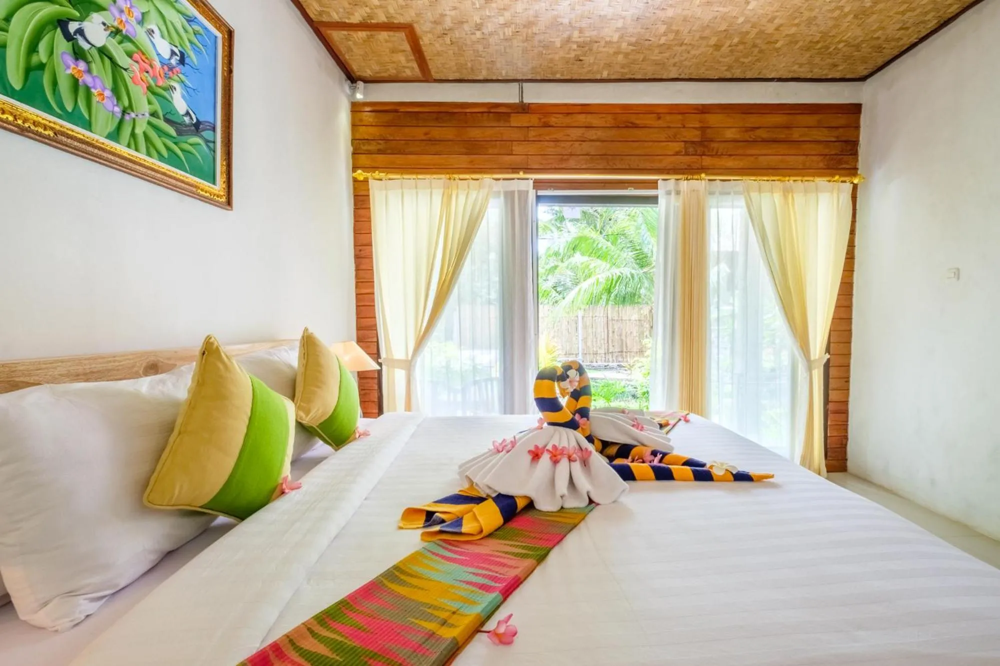 Bed in Crystal Bay Bungalows