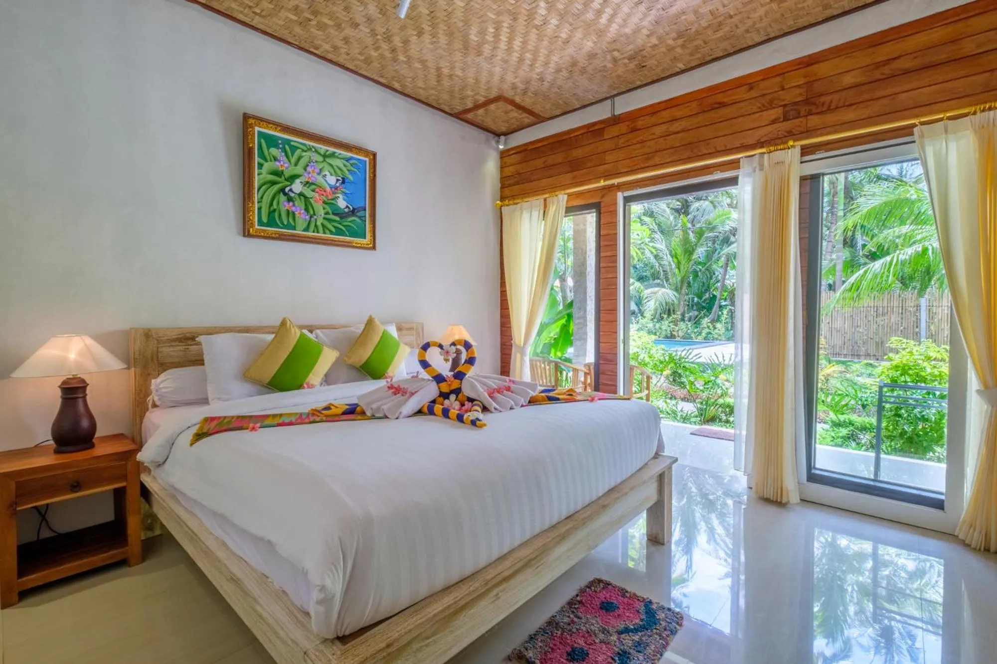 Bed in Crystal Bay Bungalows