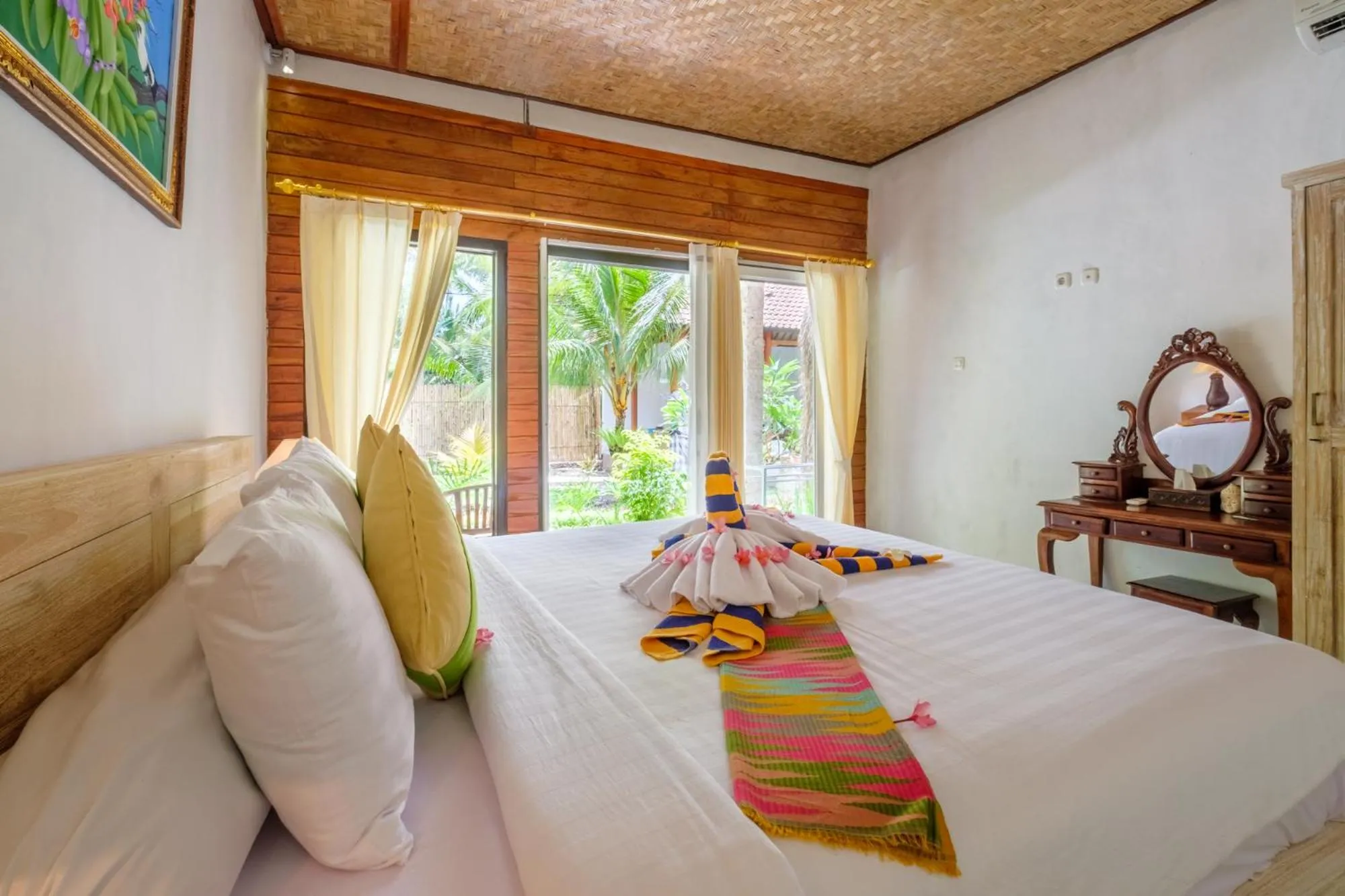 Bed in Crystal Bay Bungalows