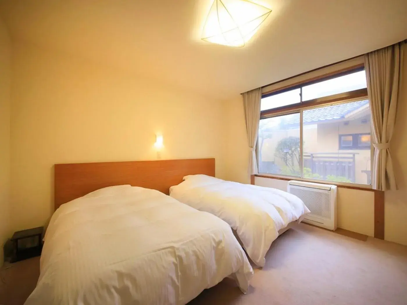 Economy Twin Room with Tatami Area in Kaike Fuga Economy Twin Room with Tatami Area in Kaike Fuga