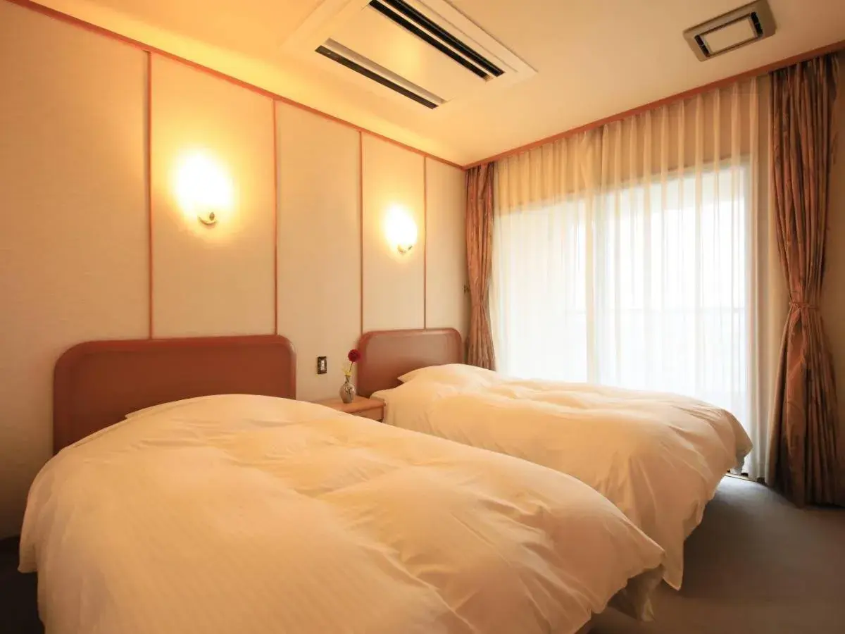 Economy Twin Room with Tatami Area in Kaike Fuga Economy Twin Room with Tatami Area in Kaike Fuga