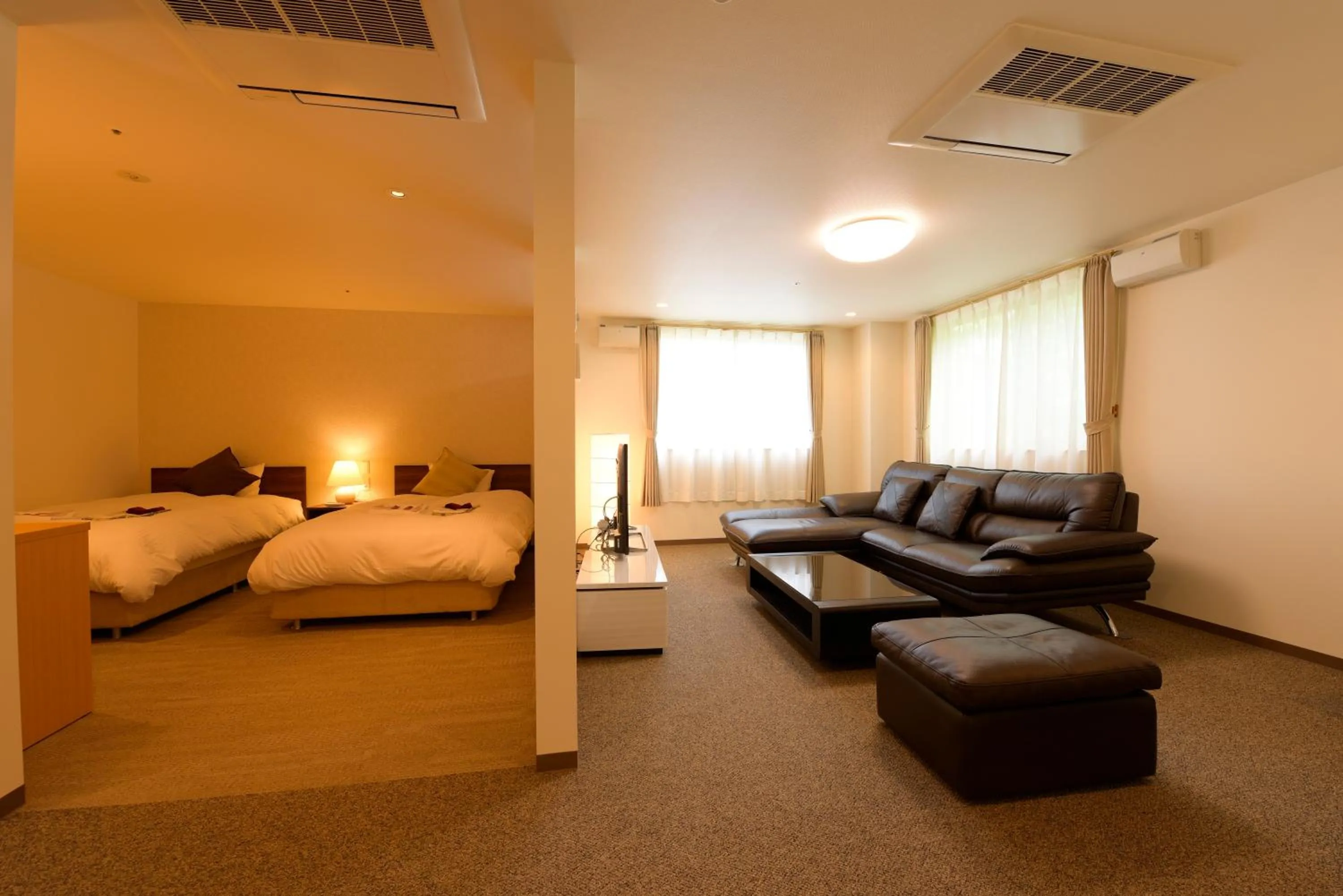 Living room, Bed in Sun Plaza Hotel Fuji Lake Yamanaka