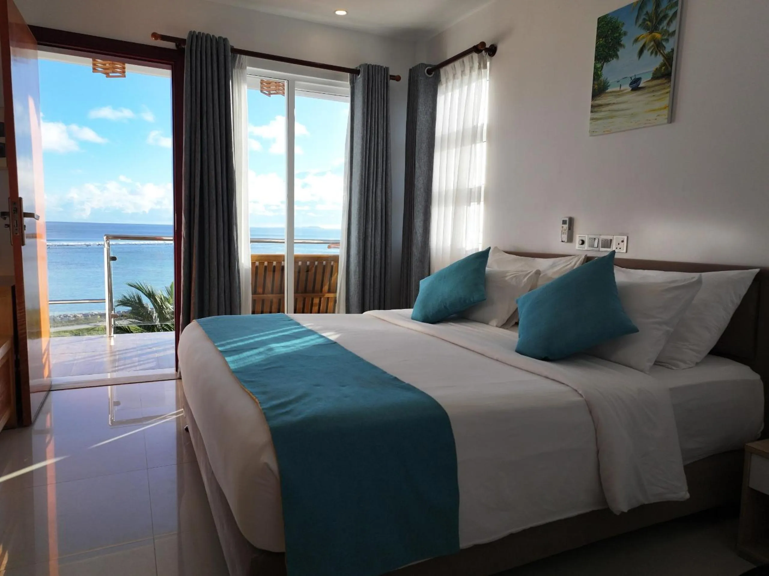 Bed in Reef Edge Thulusdhoo, Maldives