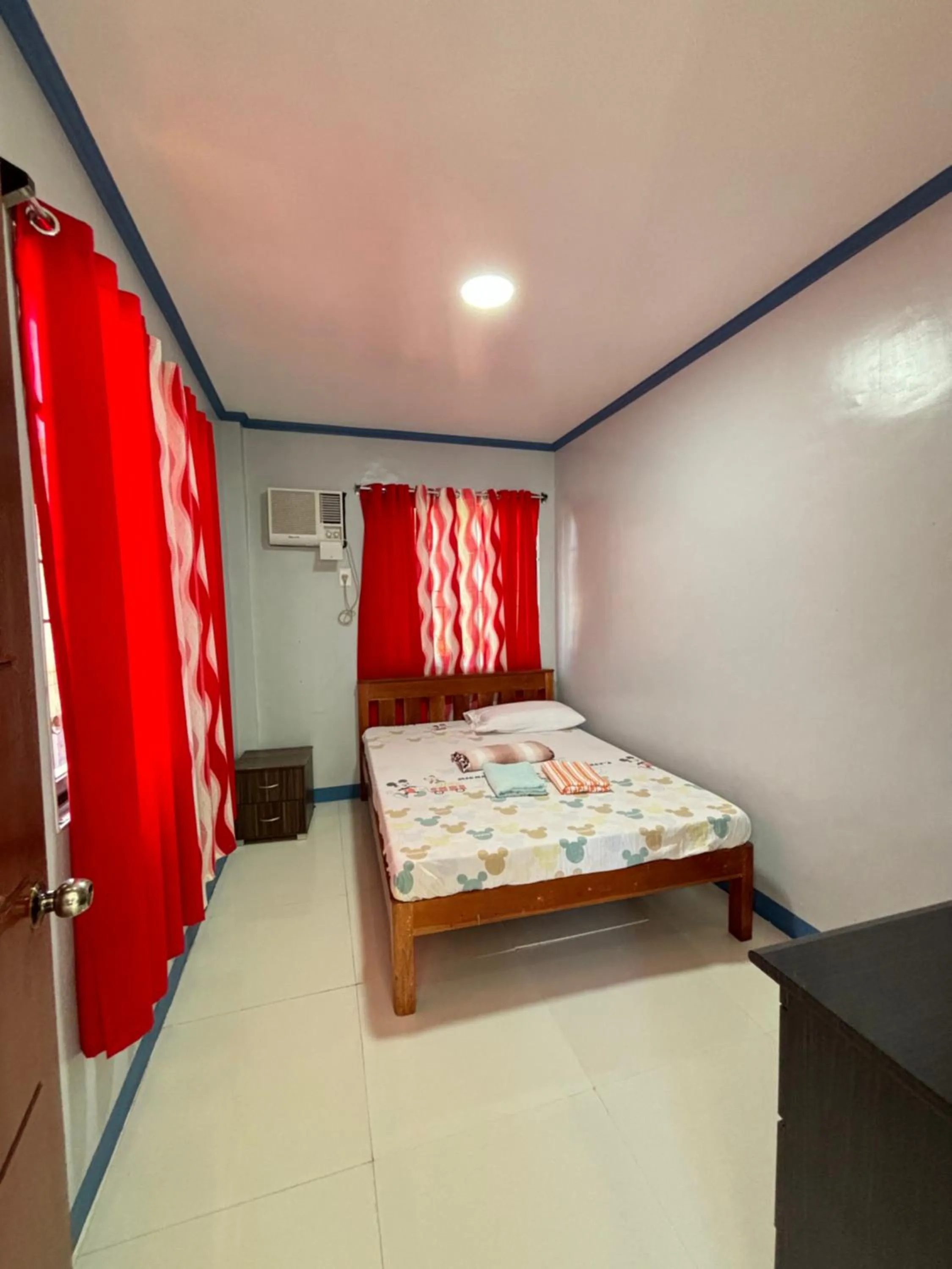 Bed in La Fela Pension House